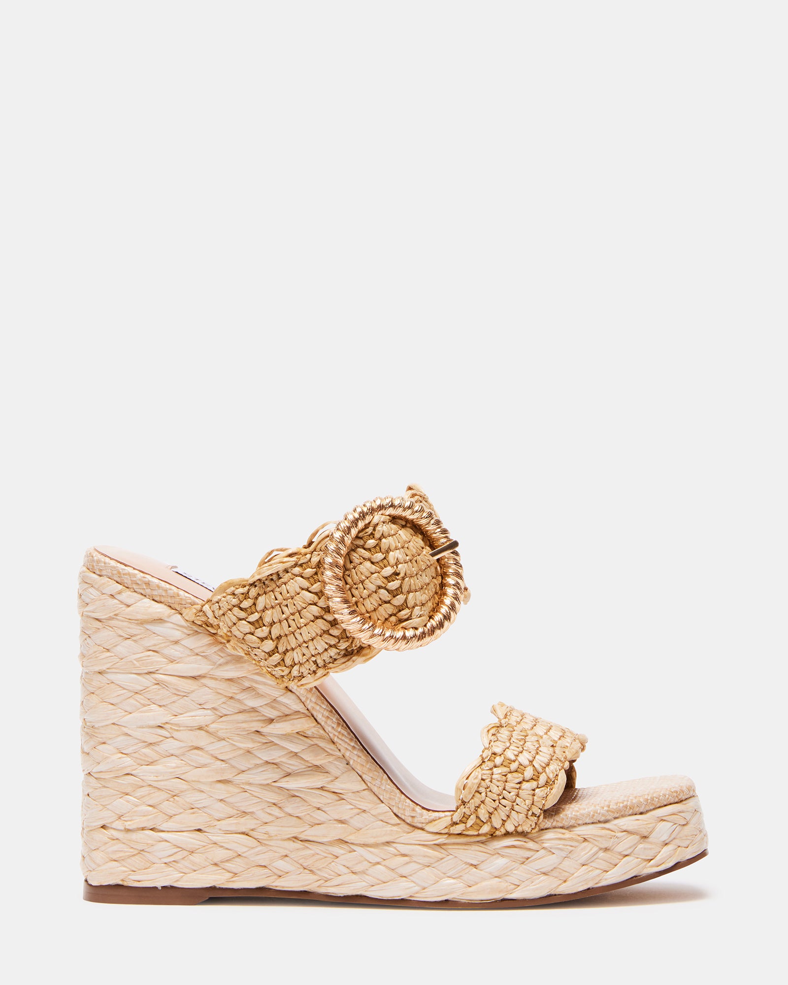 Close-up of raffia wedge sandals showing braided finish and square toe design