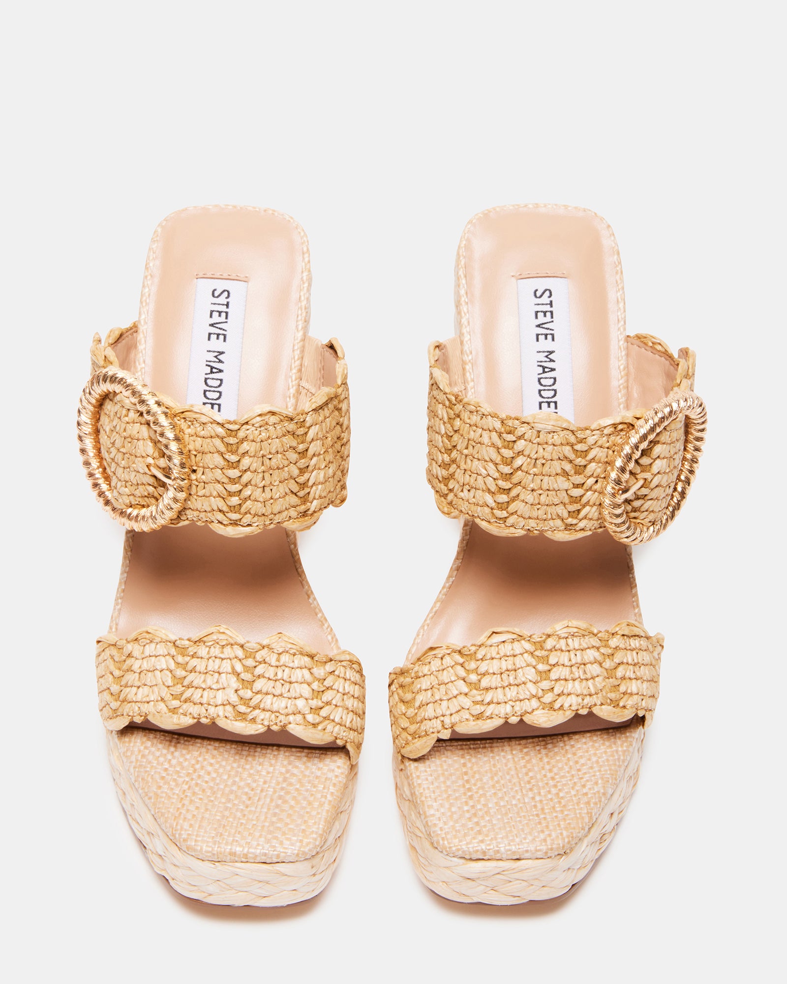 Side view of raffia platform wedge sandals with buckle detail and heel height