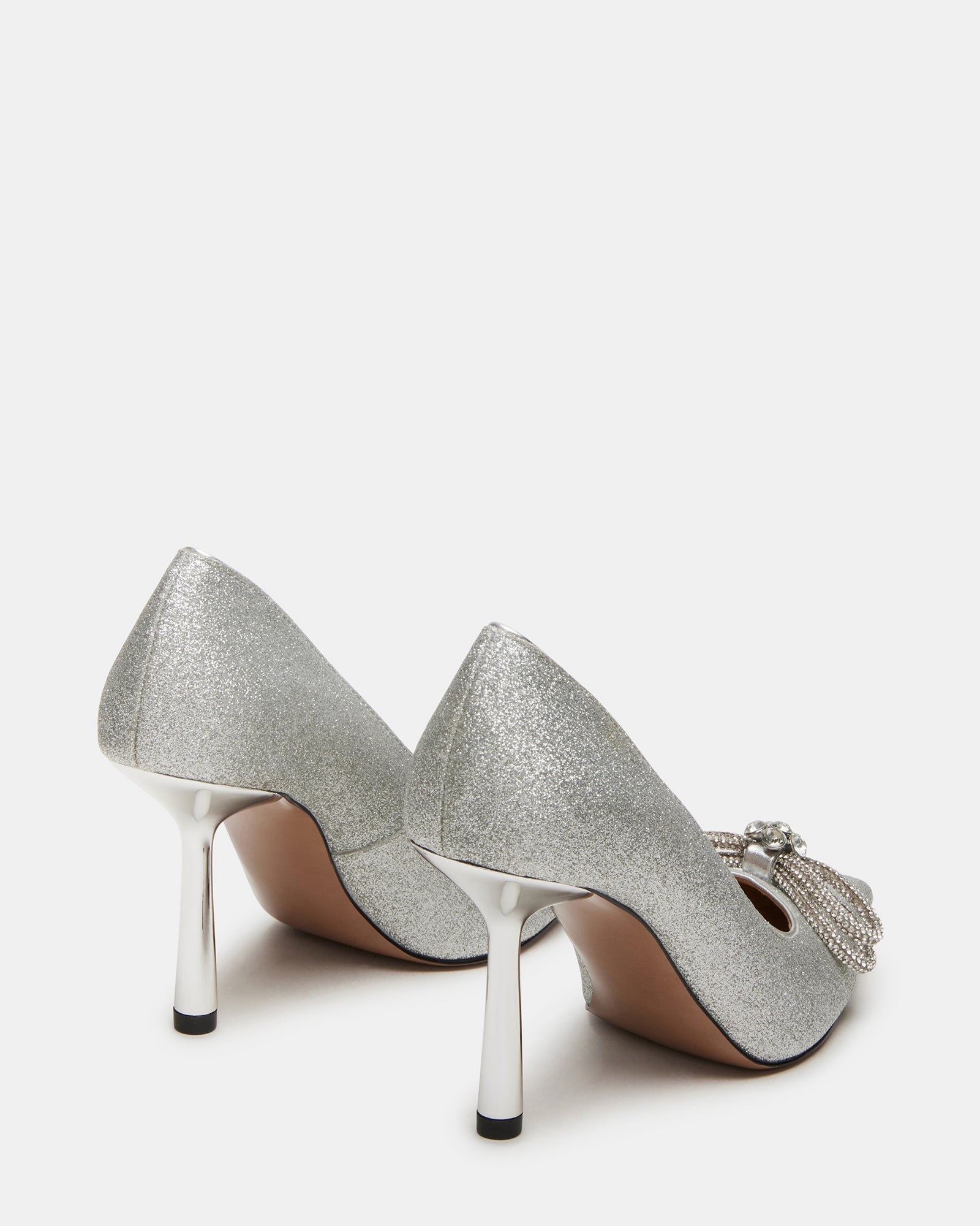 Close-up of glitter pumps showing rhinestone embellishment