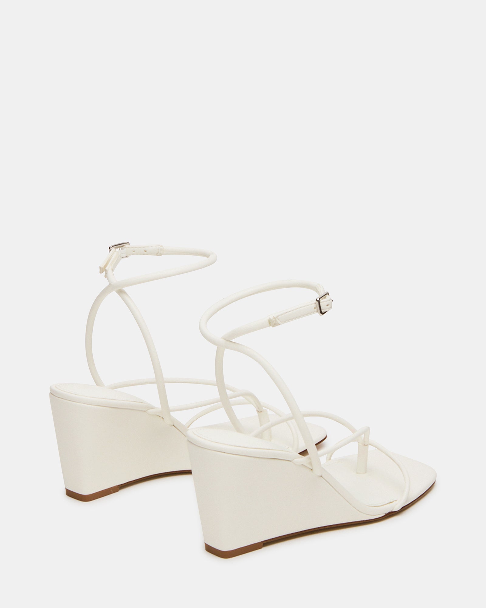 Close-up of the sole and heel of APPA white wedge sandals highlighting craftsmanship