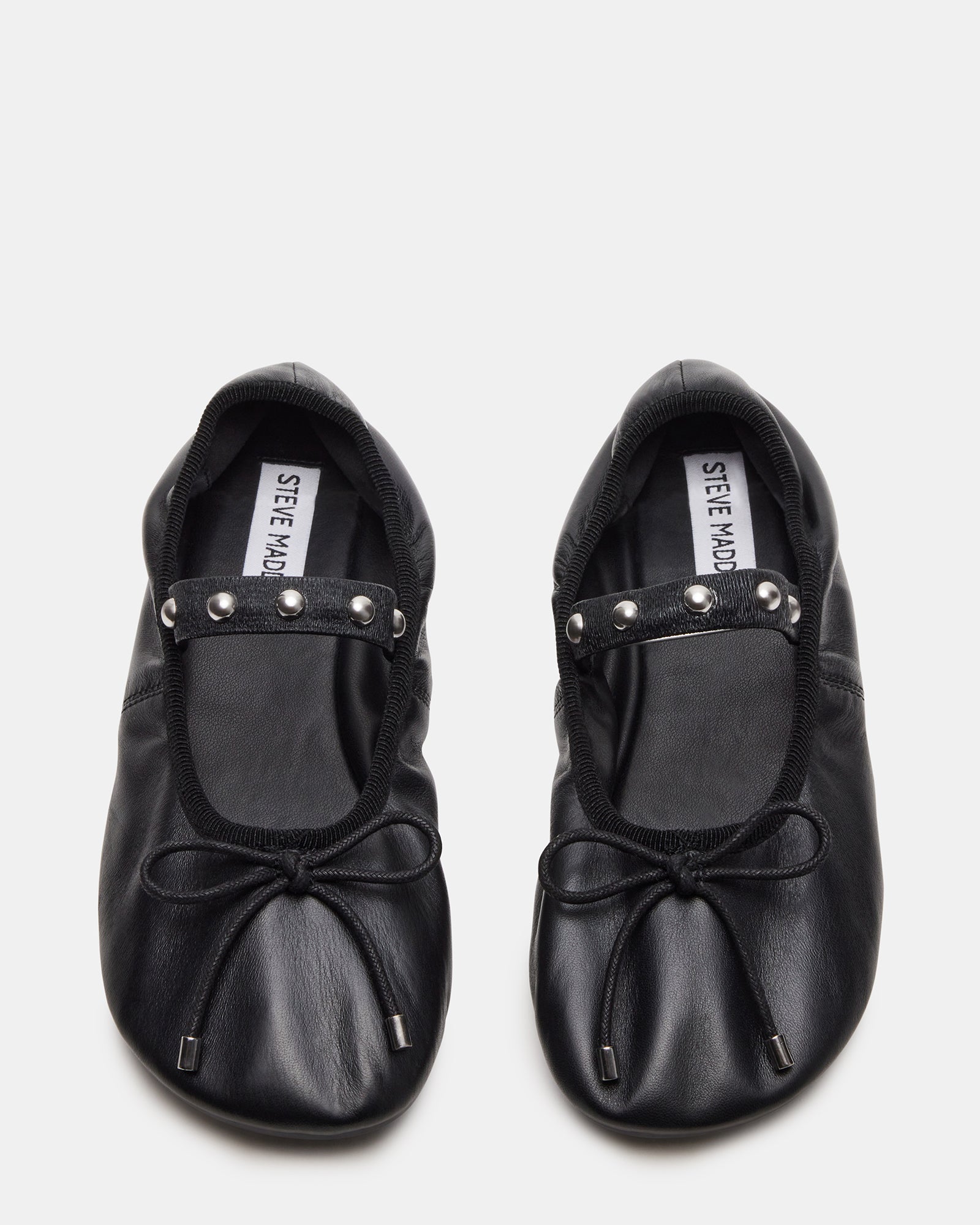 Arabella black ballet flats angled to show bow and stud details