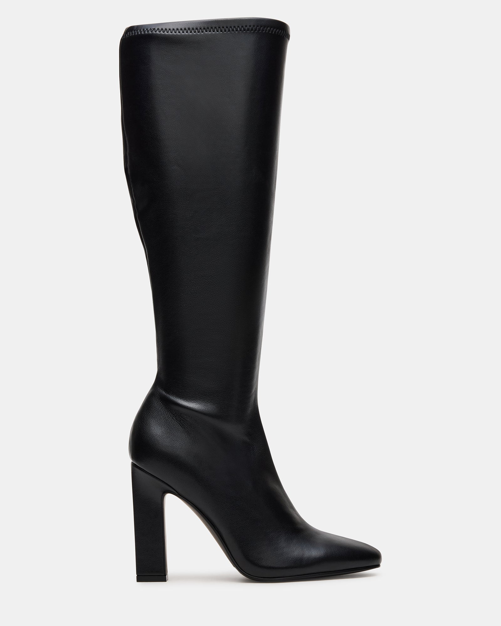 Black wide calf boots styled with skinny jeans for a chic look