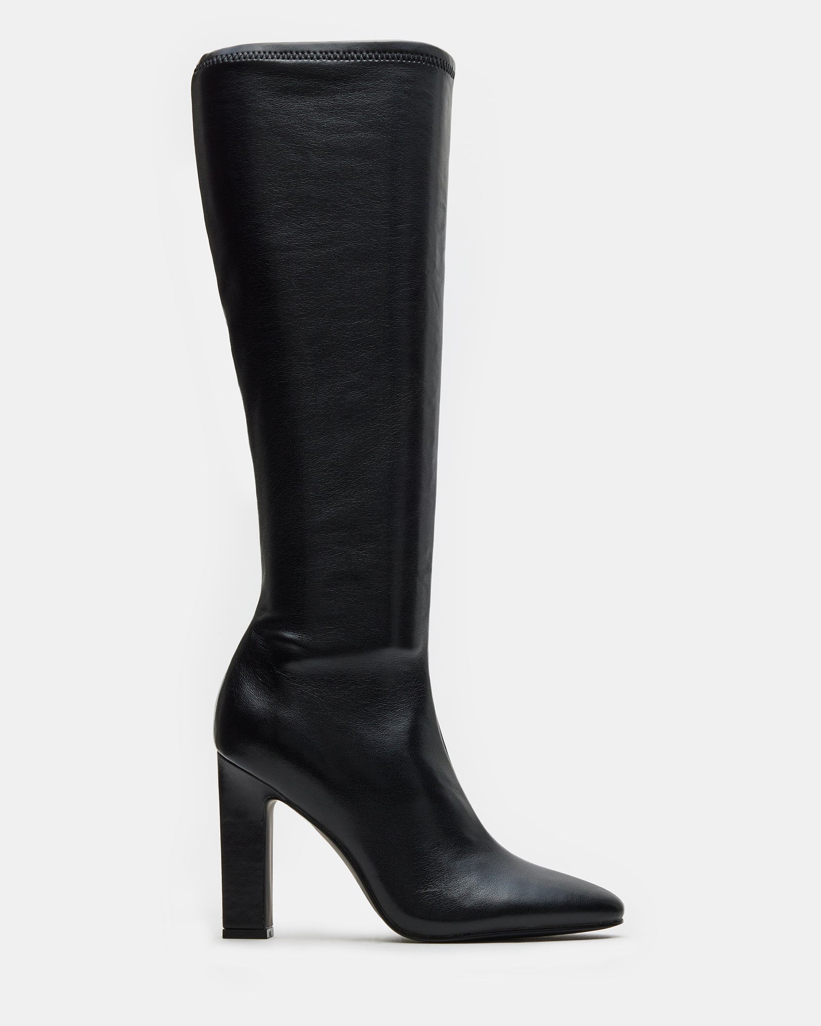 Side angle of the knee-high black boots showing heel and shaft details