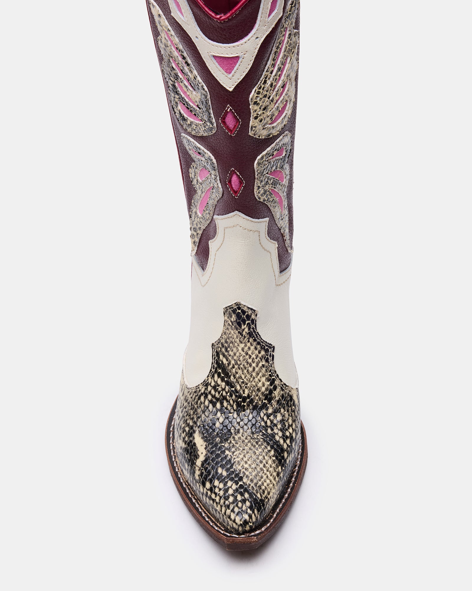 Side view of brown leather cowgirl boots with pointed toe and Western style