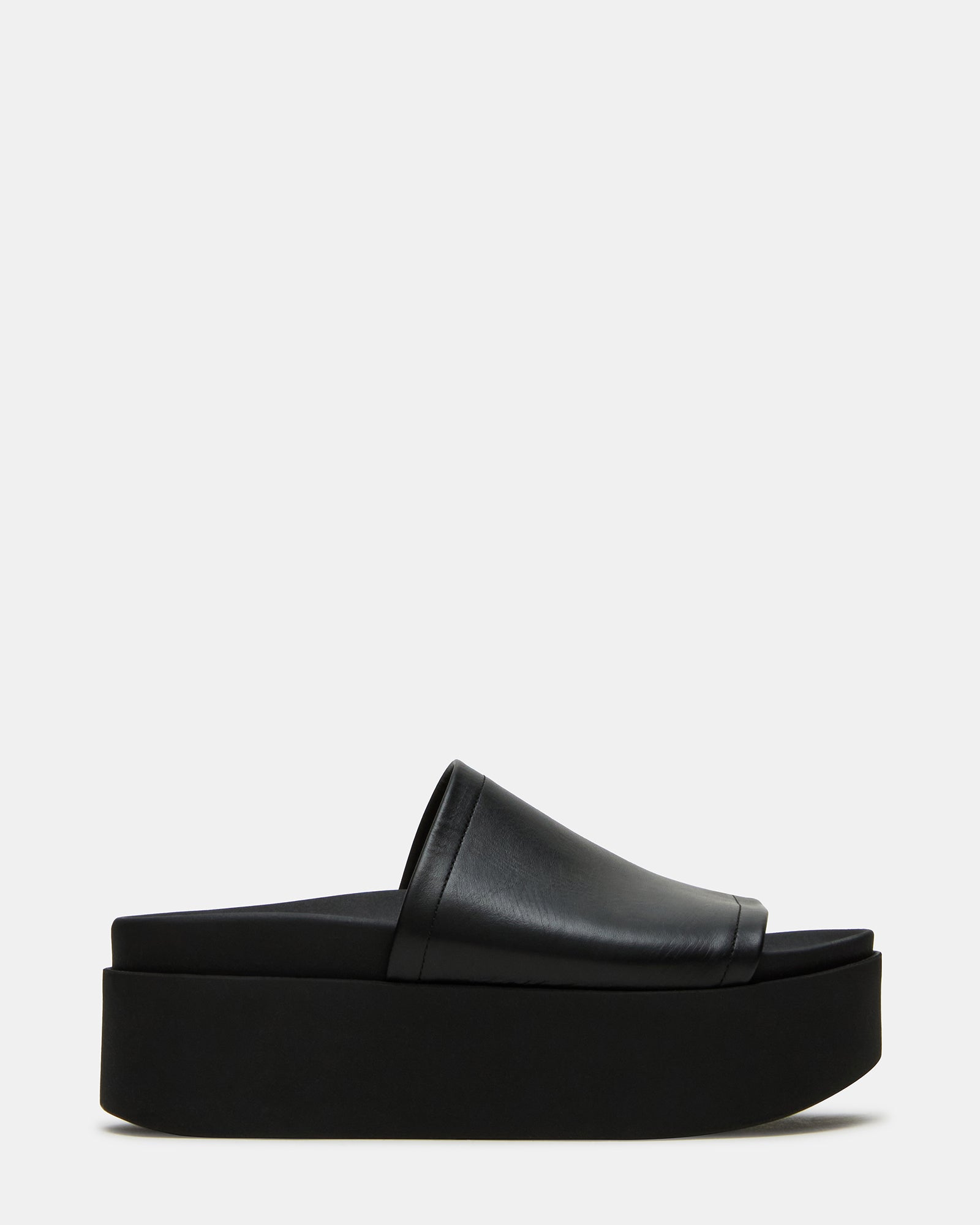 Side view of ARWEN black leather platform sandals showing the chunky sole and stylish design