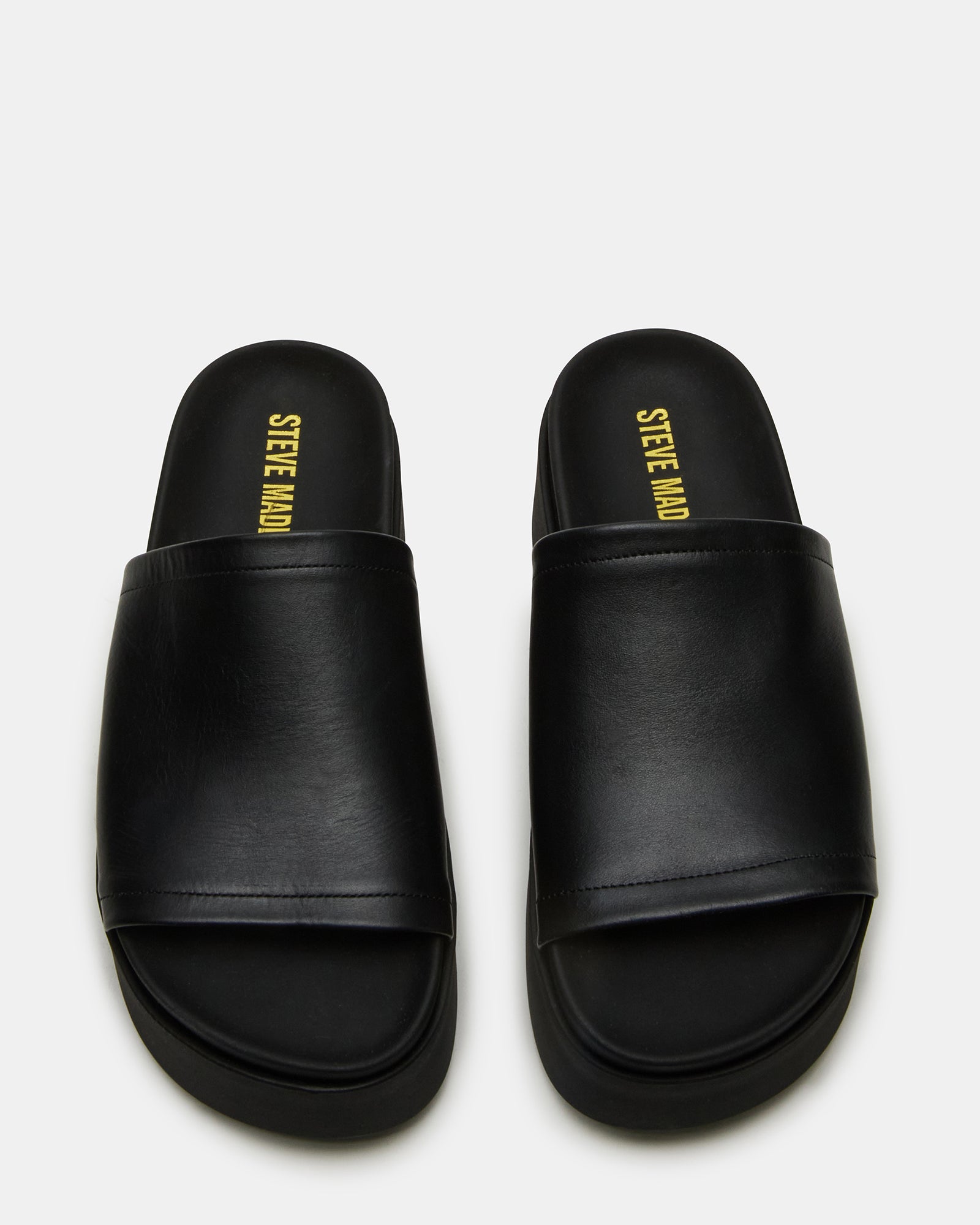 Side view of ARWEN black leather platform sandals showing the chunky sole and stylish design