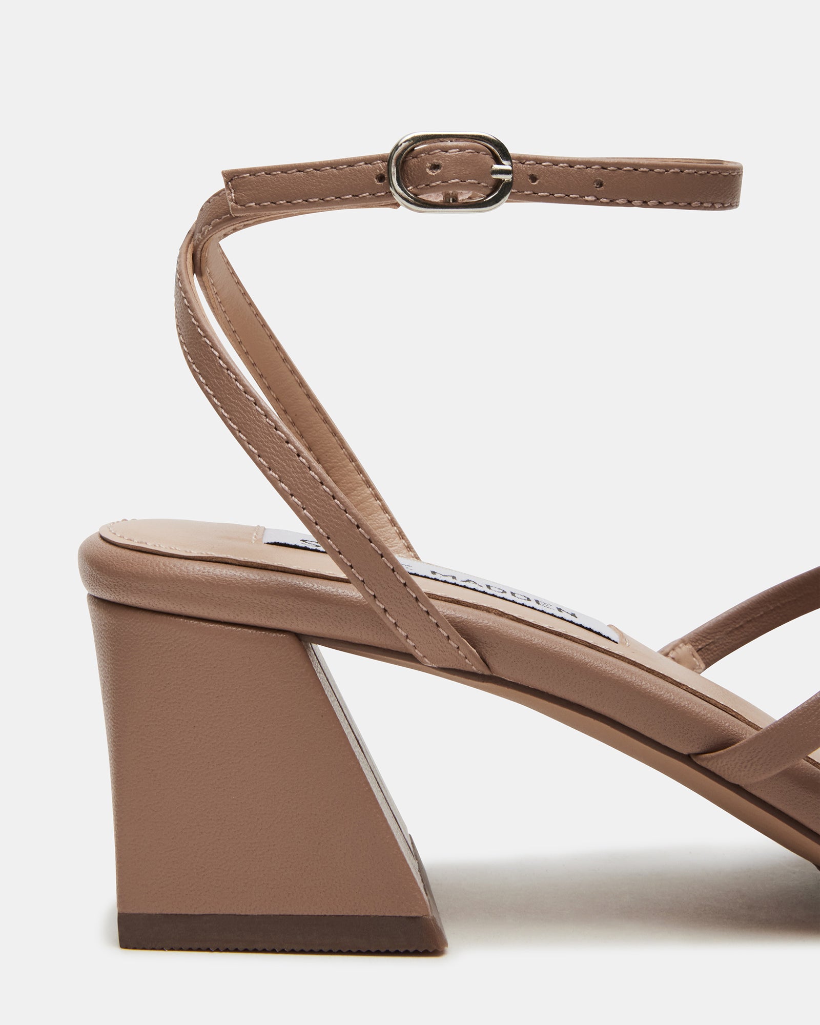 Ashlynn black ankle strap sandals with square toe, front view on a wooden floor.