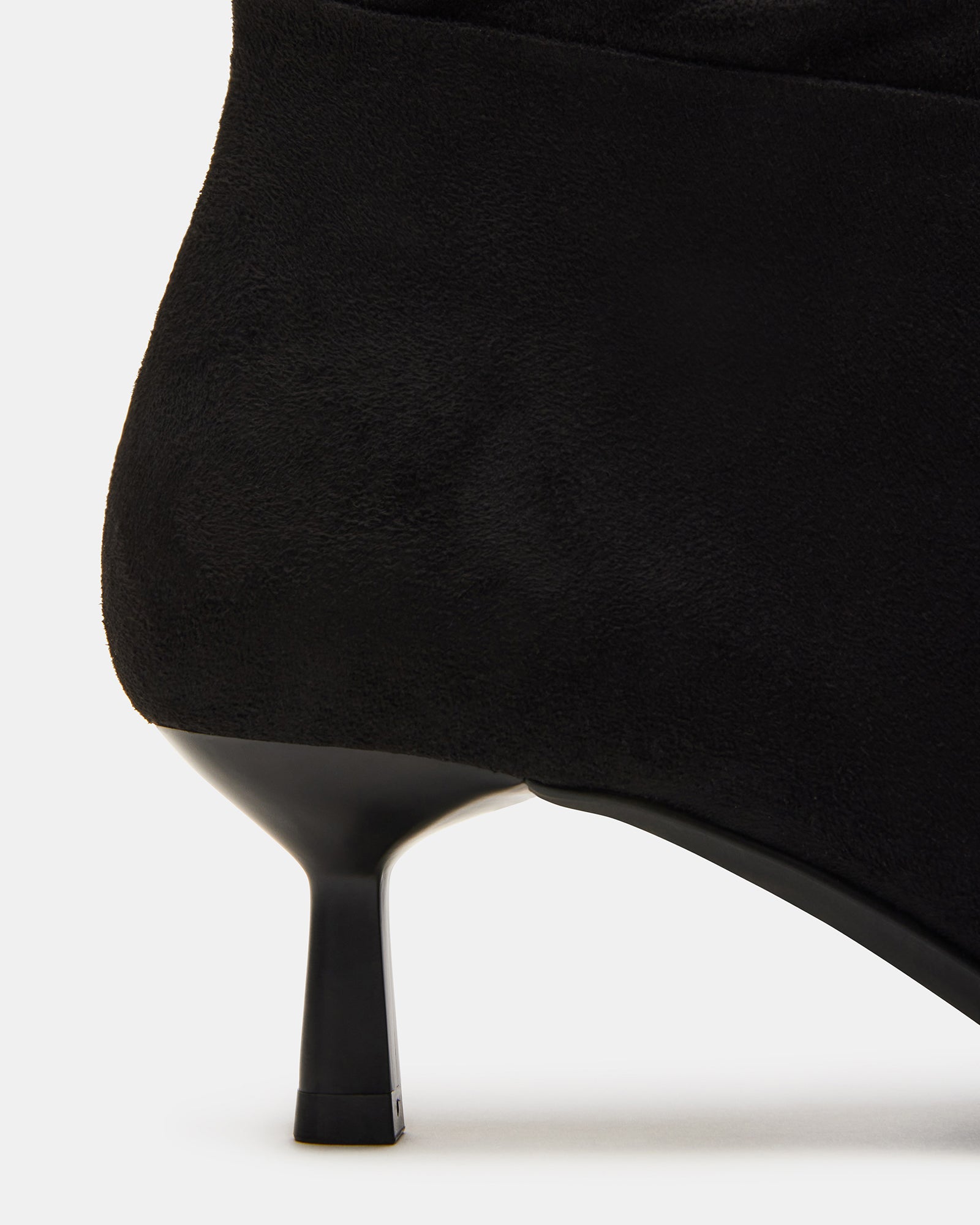 Side view of Astoria Black knee-high boots with pointed toe and kitten heel