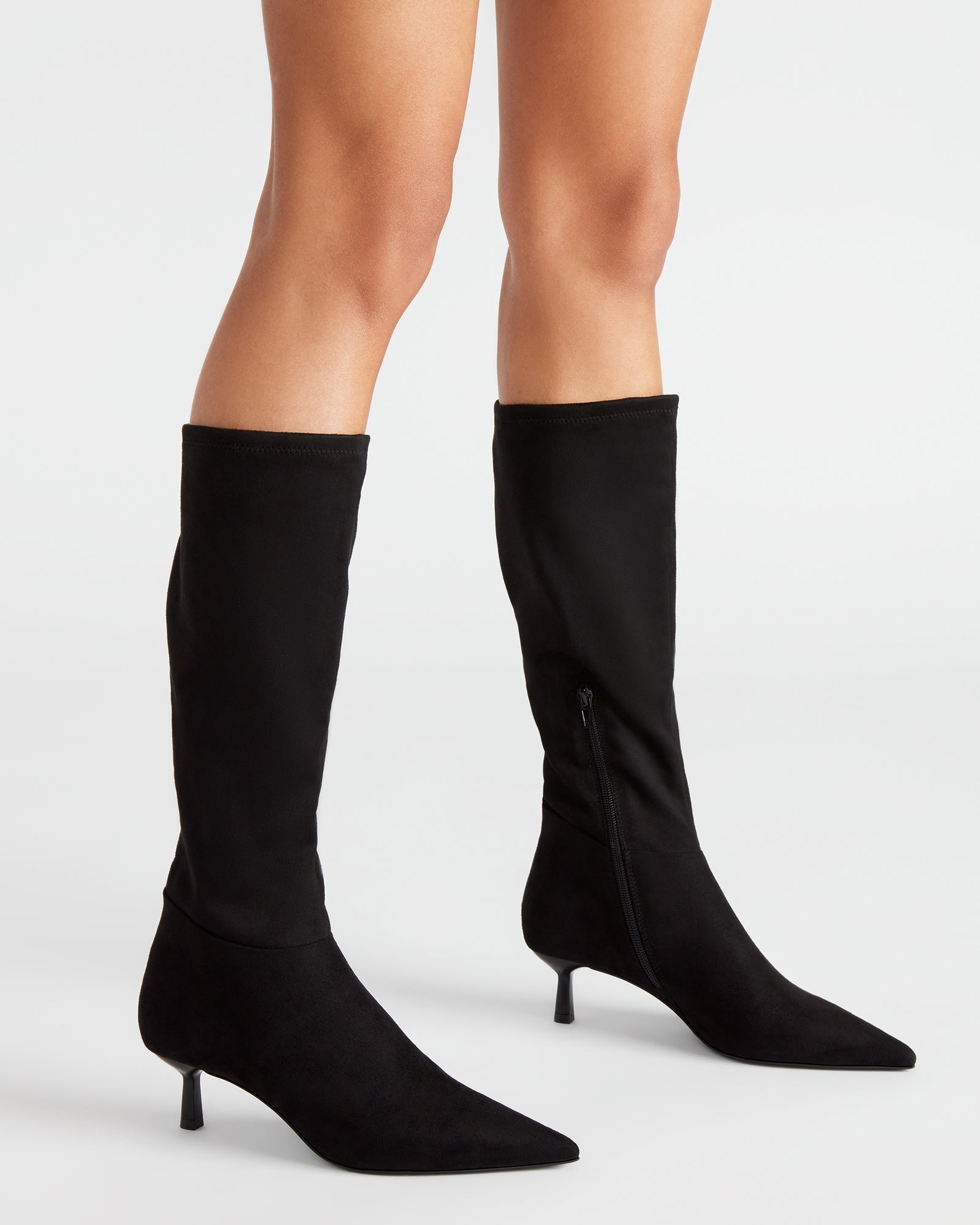 Fashionable outfit featuring Astoria Black pointed toe boots for a night out