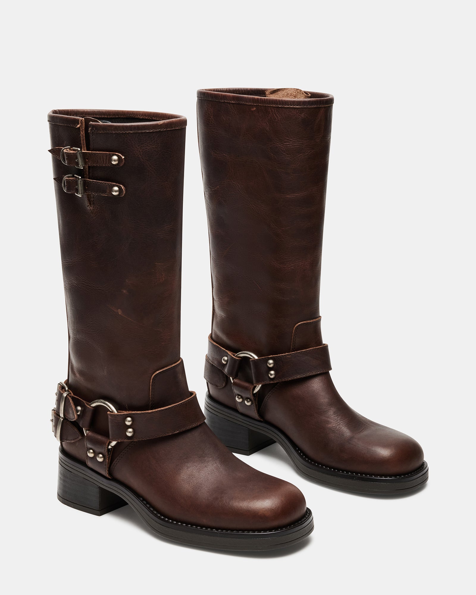 Engineer boots styled with denim for urban rugged look