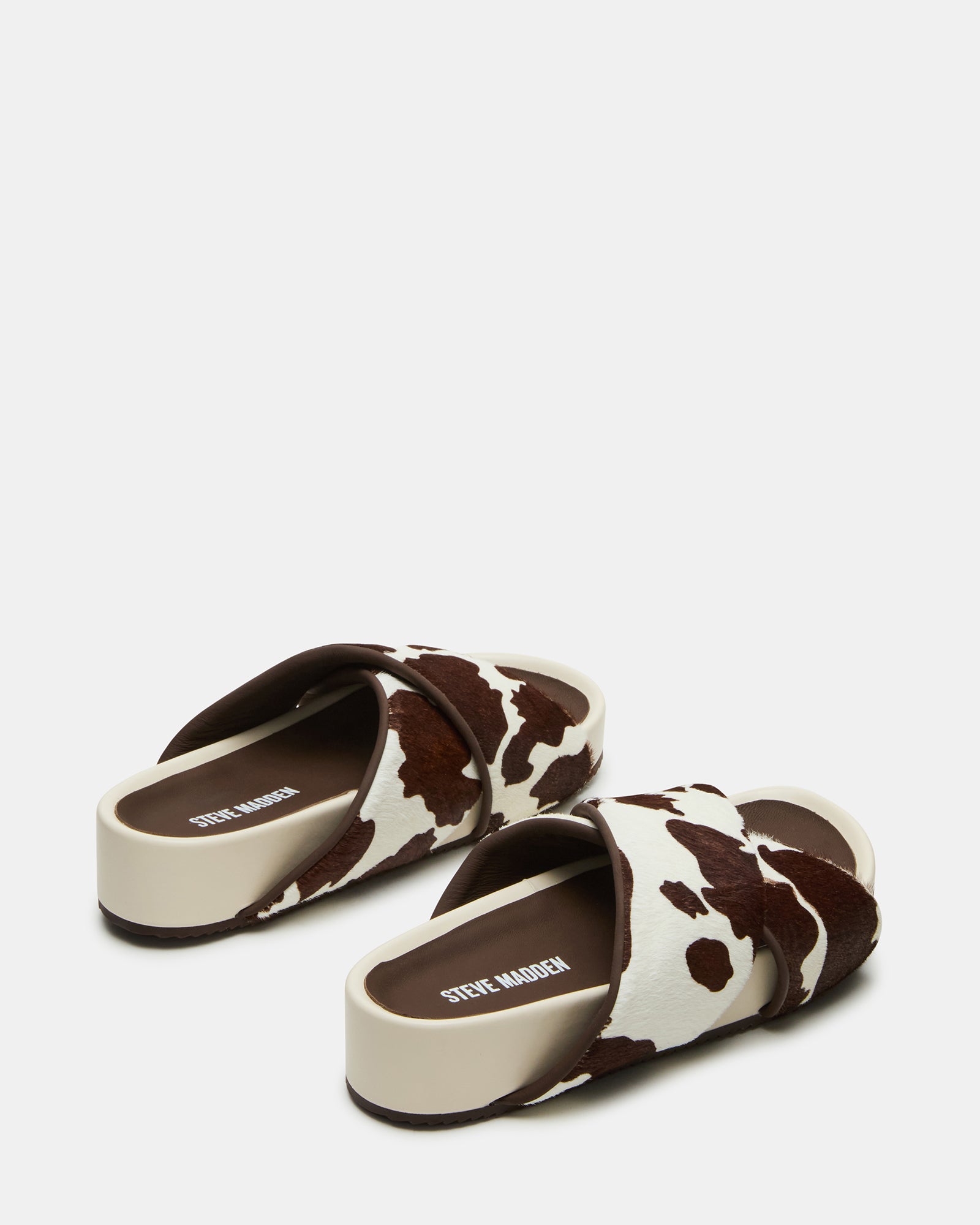 Close-up of the genuine leather upper with cow print pattern on AVENDRA sandals
