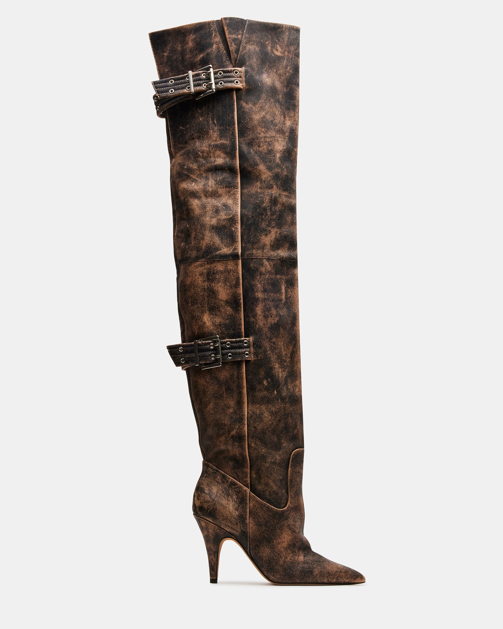 Distressed leather over-the-knee boots with pointed toe and buckle detail, side view