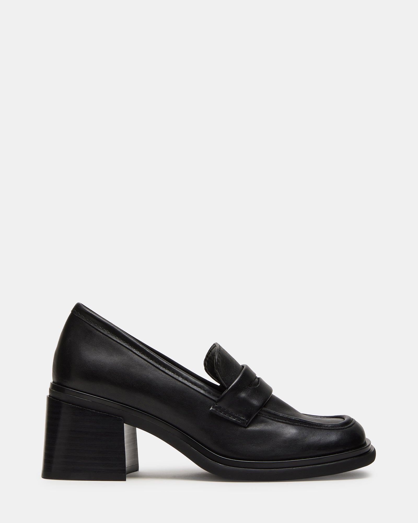 Side view of Baxter black leather loafers with block heel on a stylish backdrop.