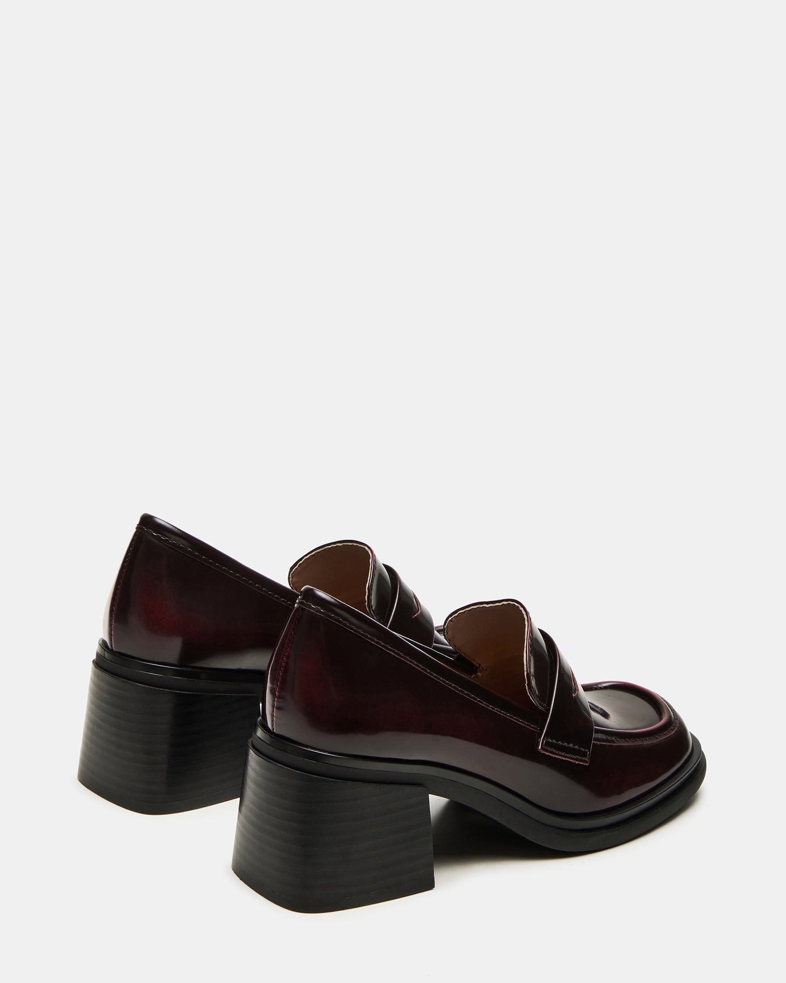 Close-up of block heel and square toe design on Baxter loafers