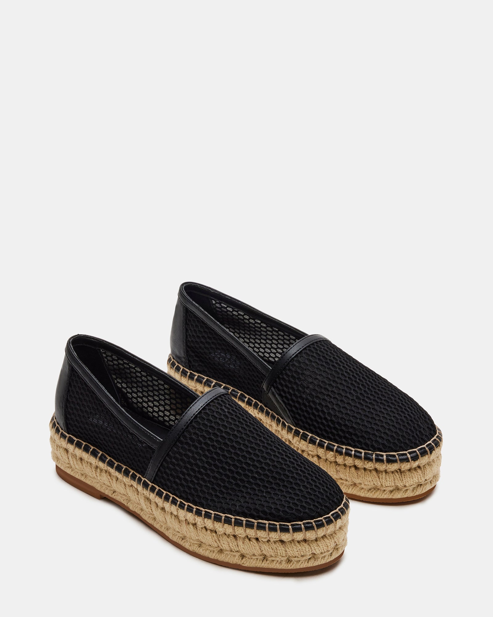 Fashionable black espadrille shoes for women styled with summer outfits