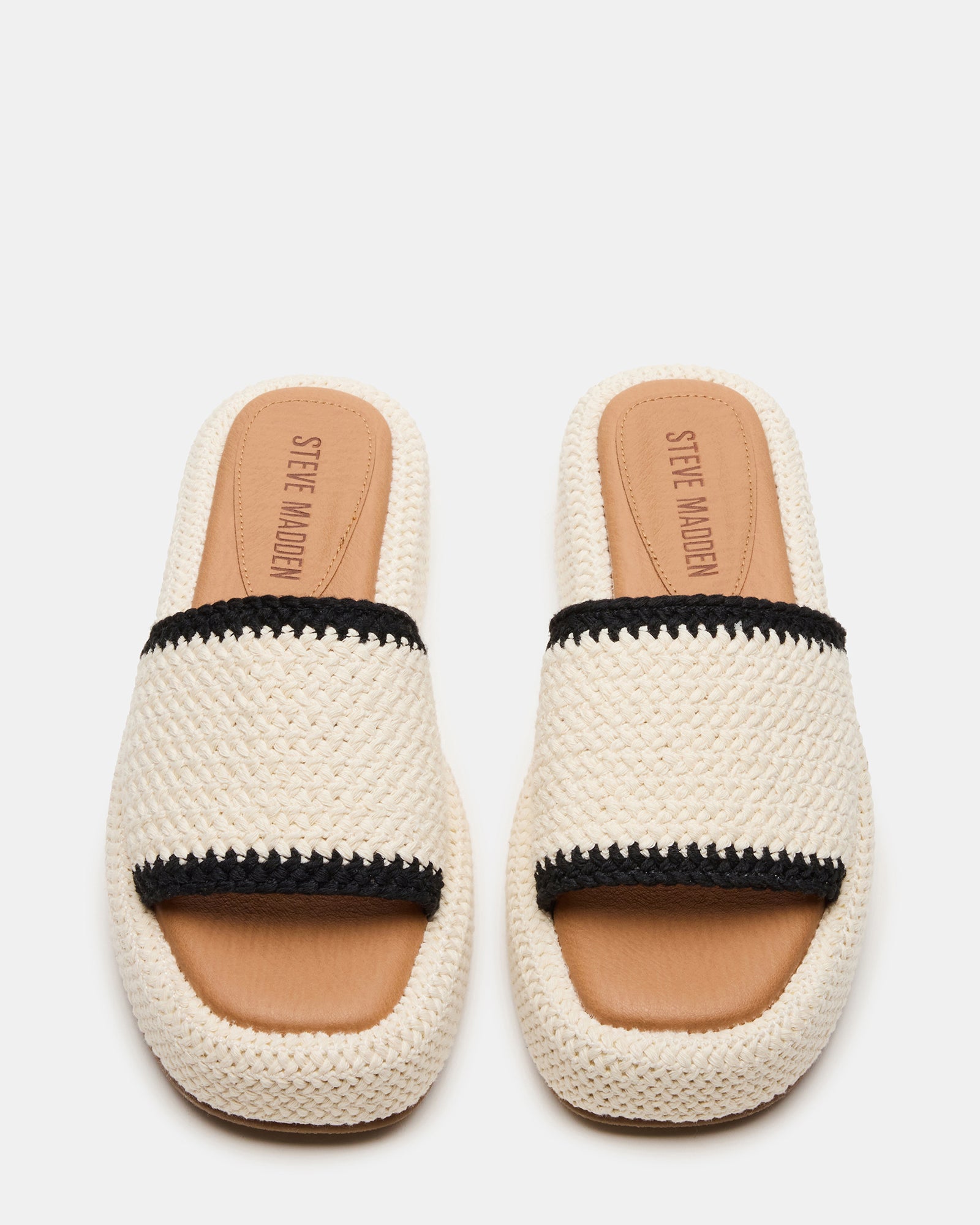 Close-up of the textured textile upper on the flatform sandals showing natural woven details