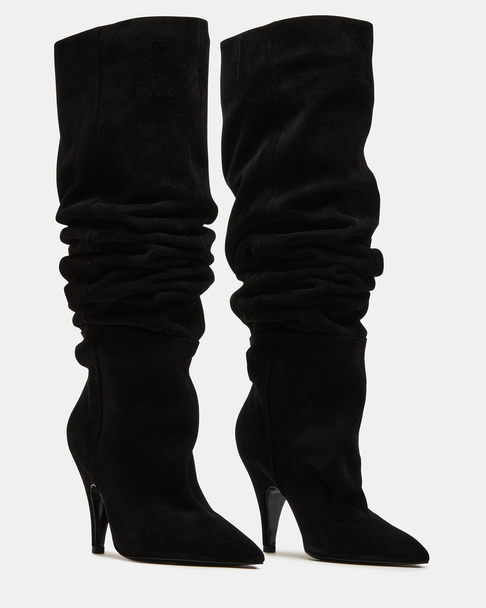 Back view of wide calf knee high boots showing flexible fit