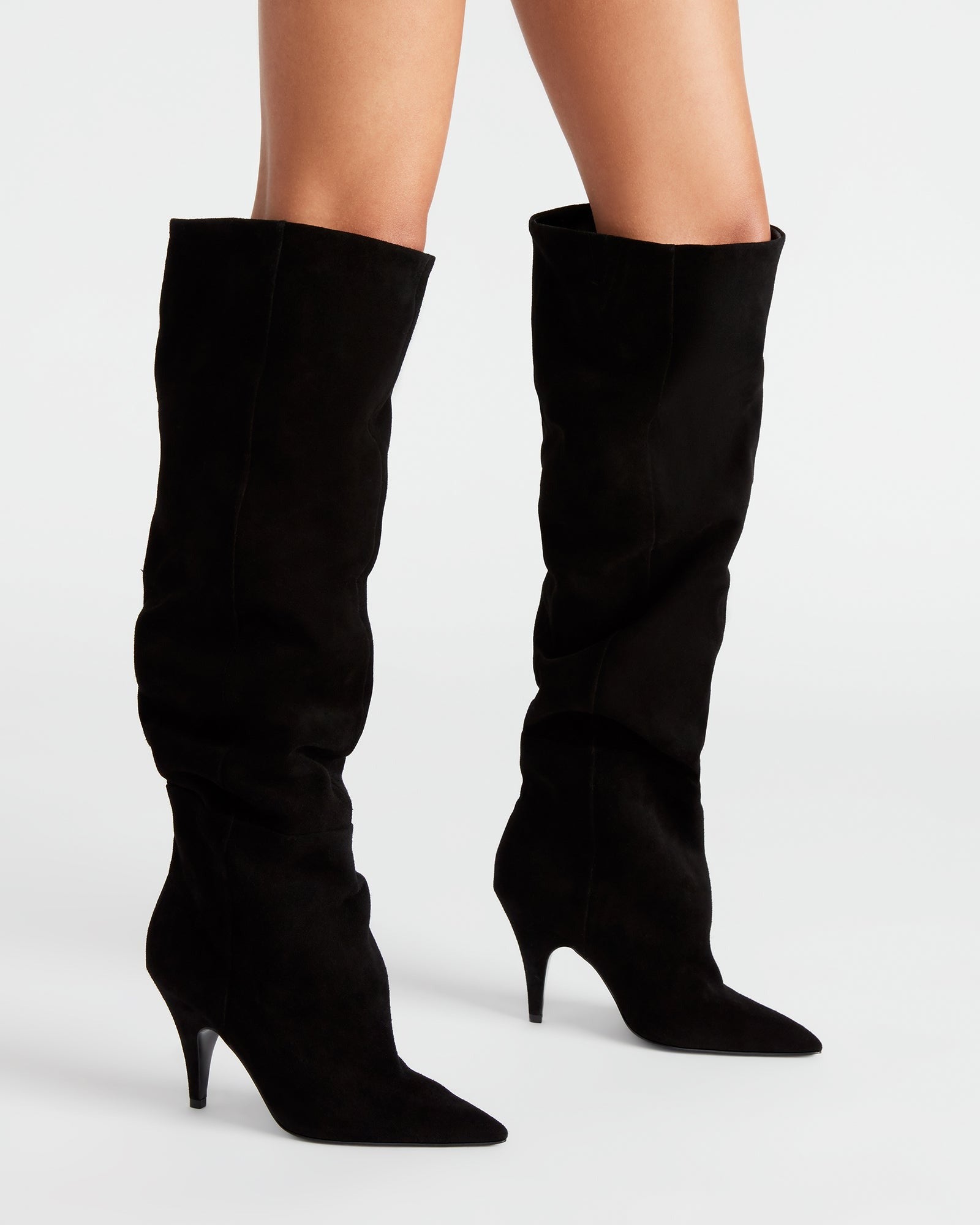 Front angle of knee high cowboy boots with scrunched texture and pointed toe