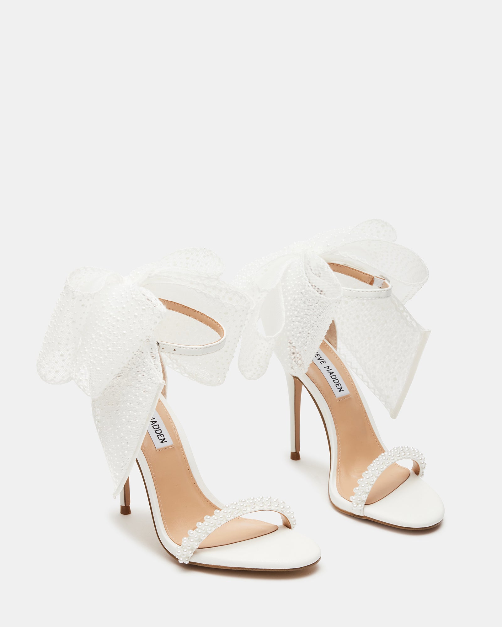 Side view of BENNI heels highlighting the 4-inch heel and vegan leather construction
