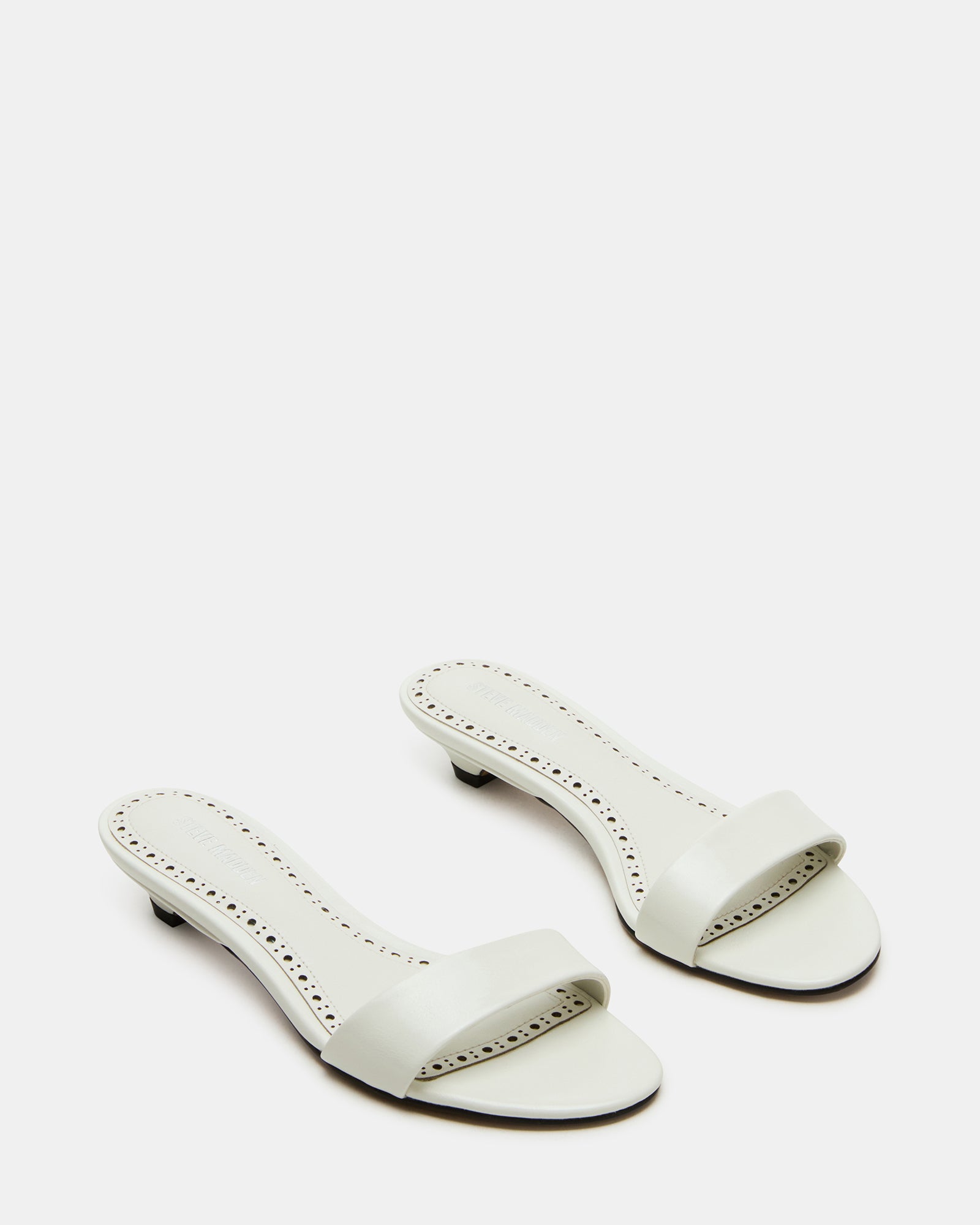 Side profile of womens mule shoes with low heel perfect for casual outings