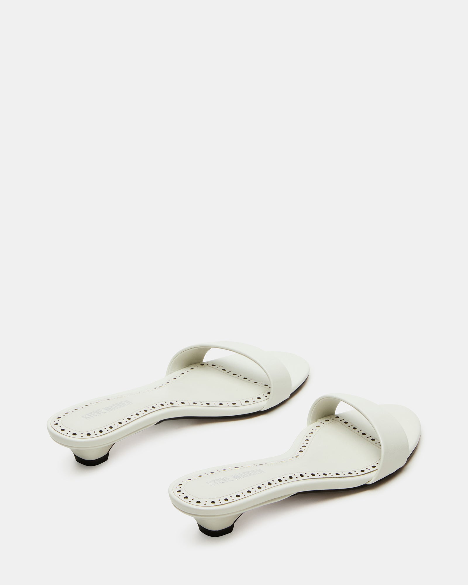 Side profile of womens mule shoes with low heel perfect for casual outings