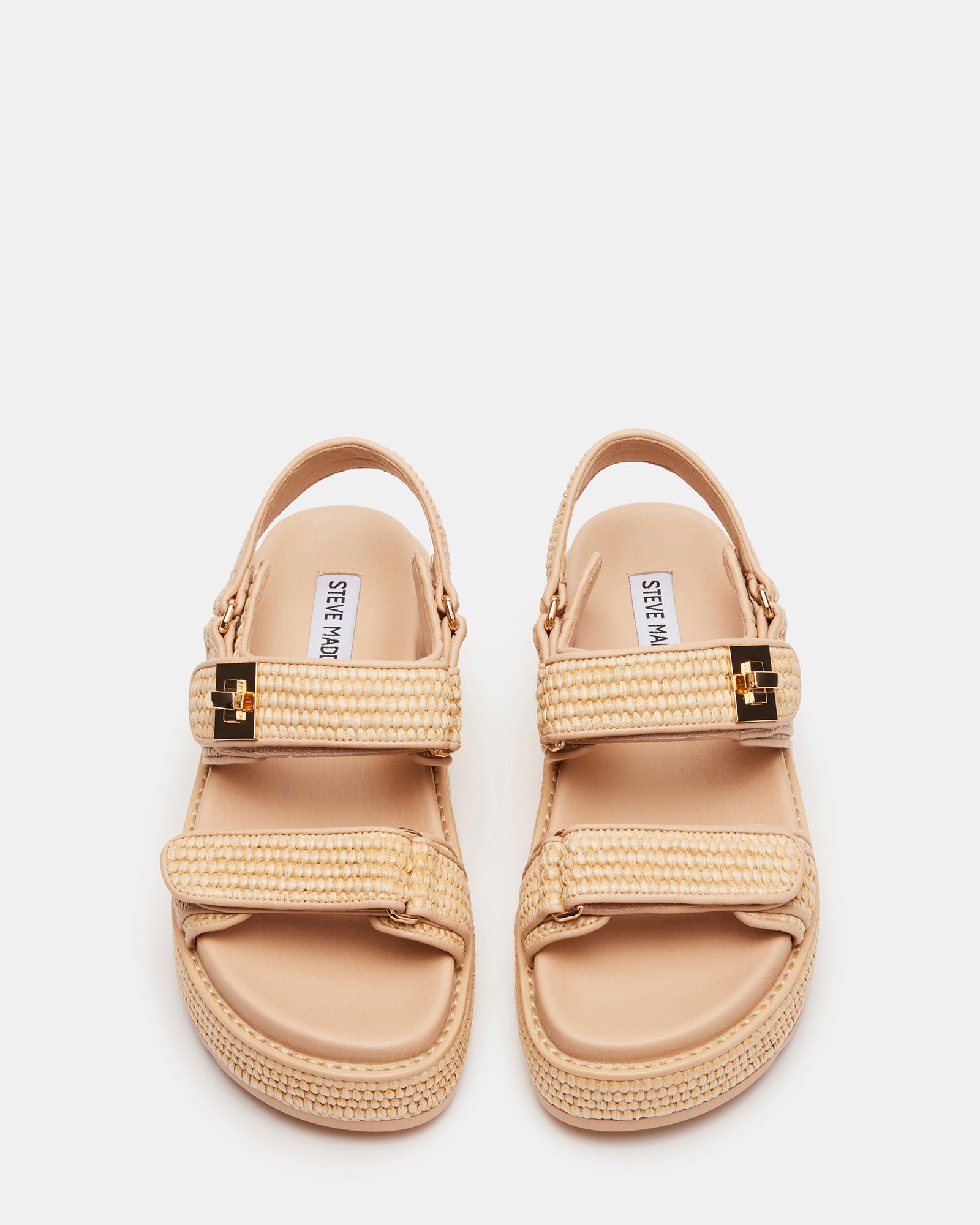Side view of stylish raffia sandals showing flatform design