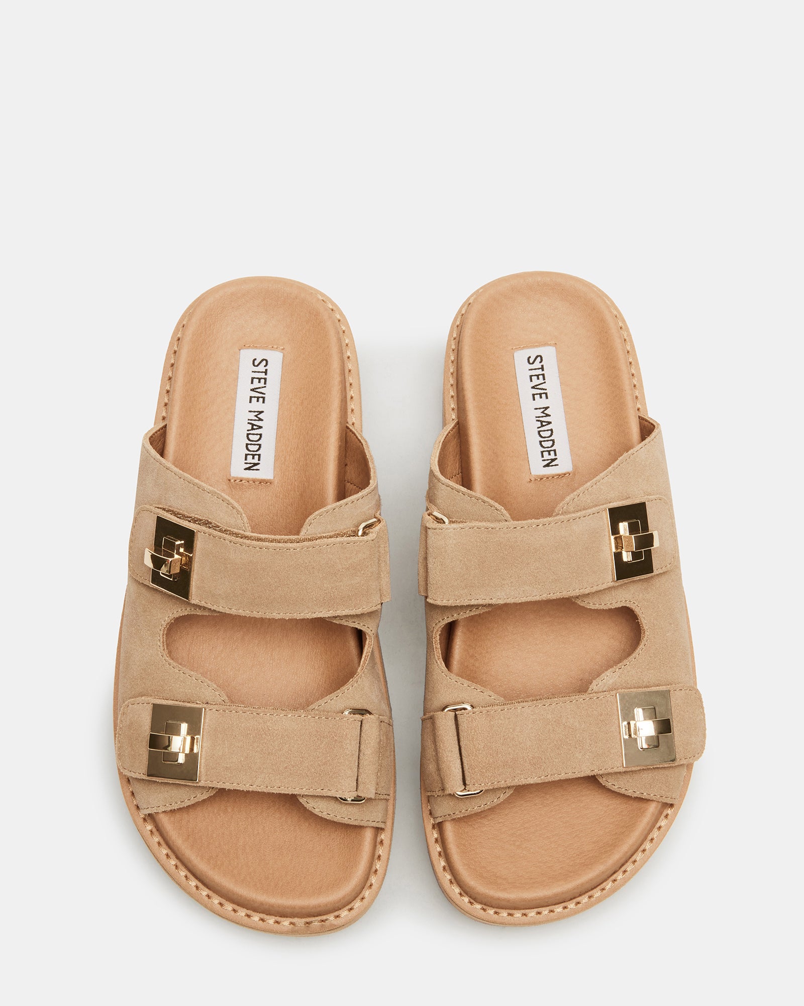 Side view of slide sandals showing turn-lock hardware detail