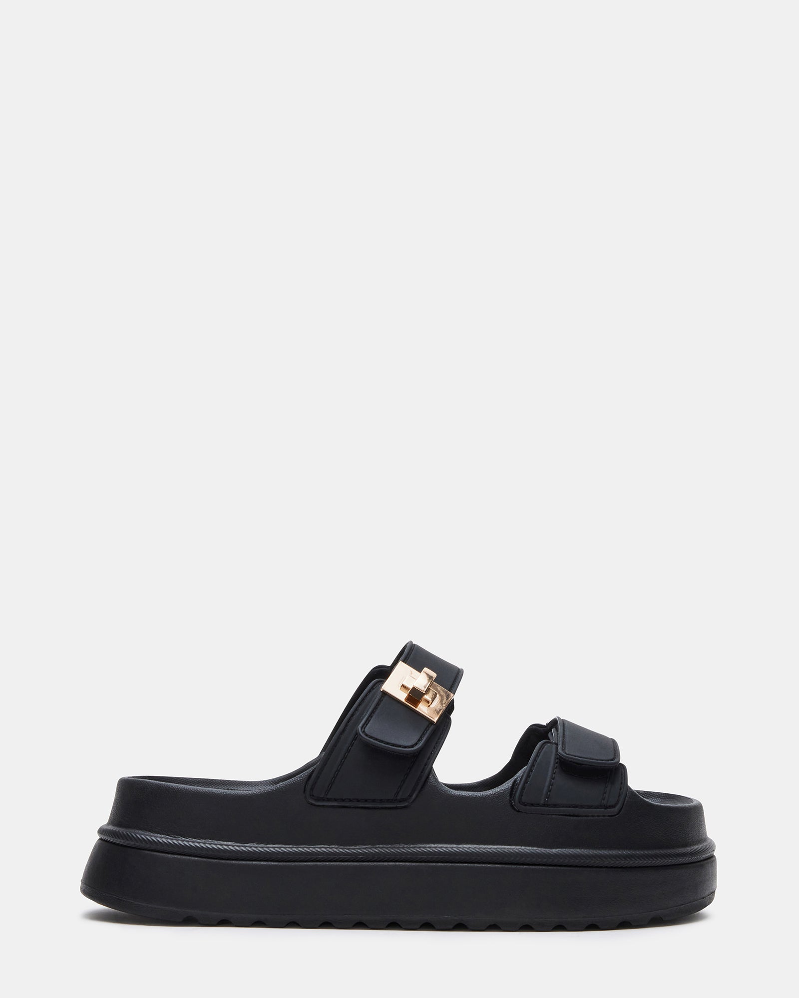 Close-up of BIGSCHMONA black platform sandals with turn-lock hardware