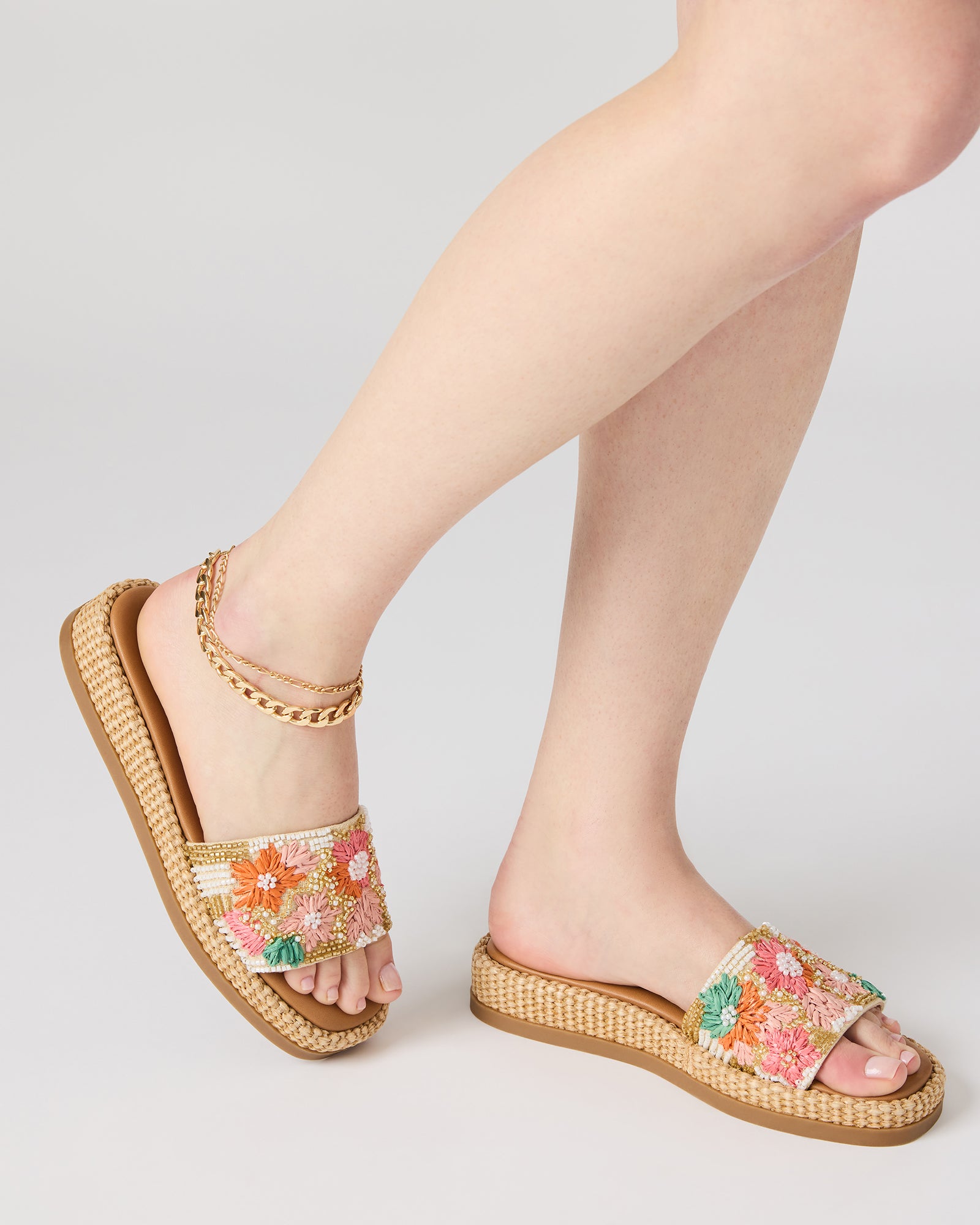 Close-up of square toe design on raffia sandals