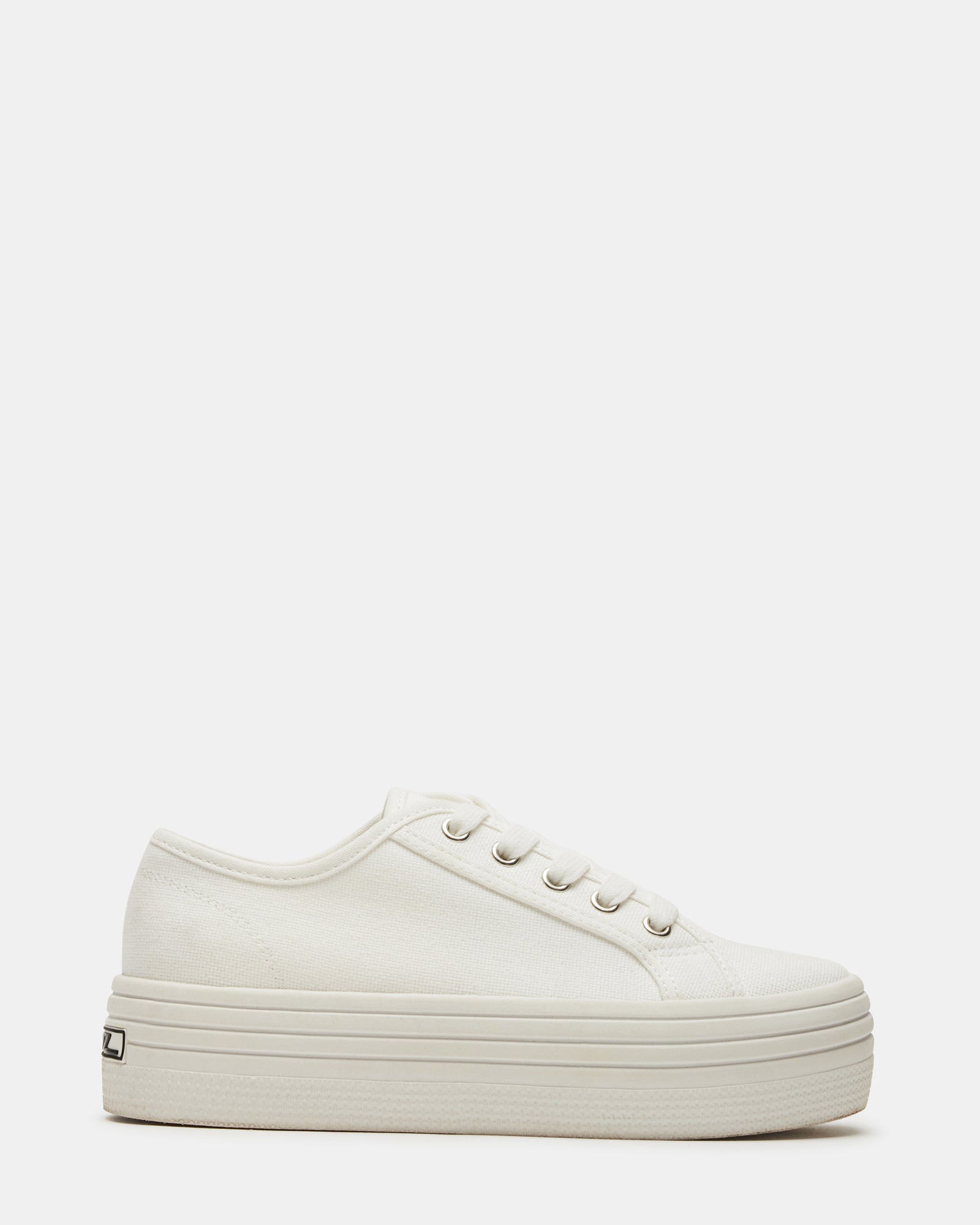 Bobbi 30 white platform sandals on a stylish background