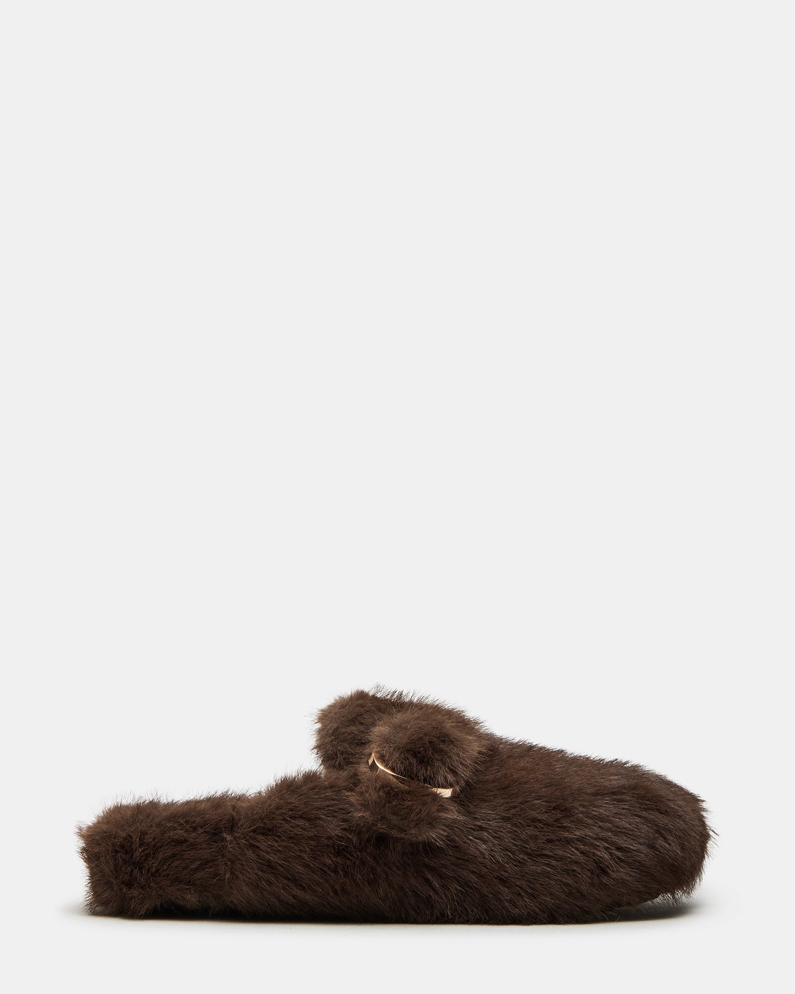 Bohan Brown faux fur slip-on shoes displayed on a wooden bench