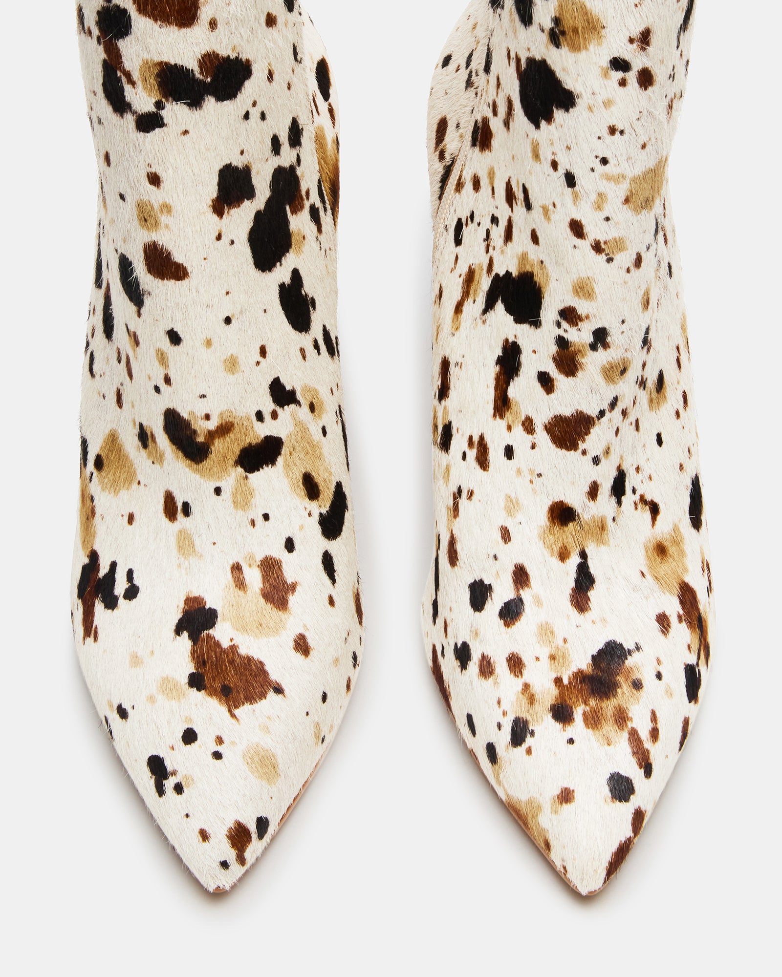Close-up of the pointed toe and heeled design on these ankle boots