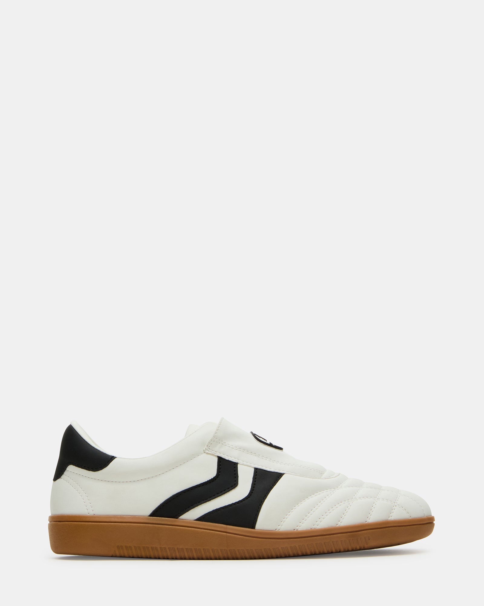 BOLT Vegan White Sneakers from the side, highlighting their sleek design.
