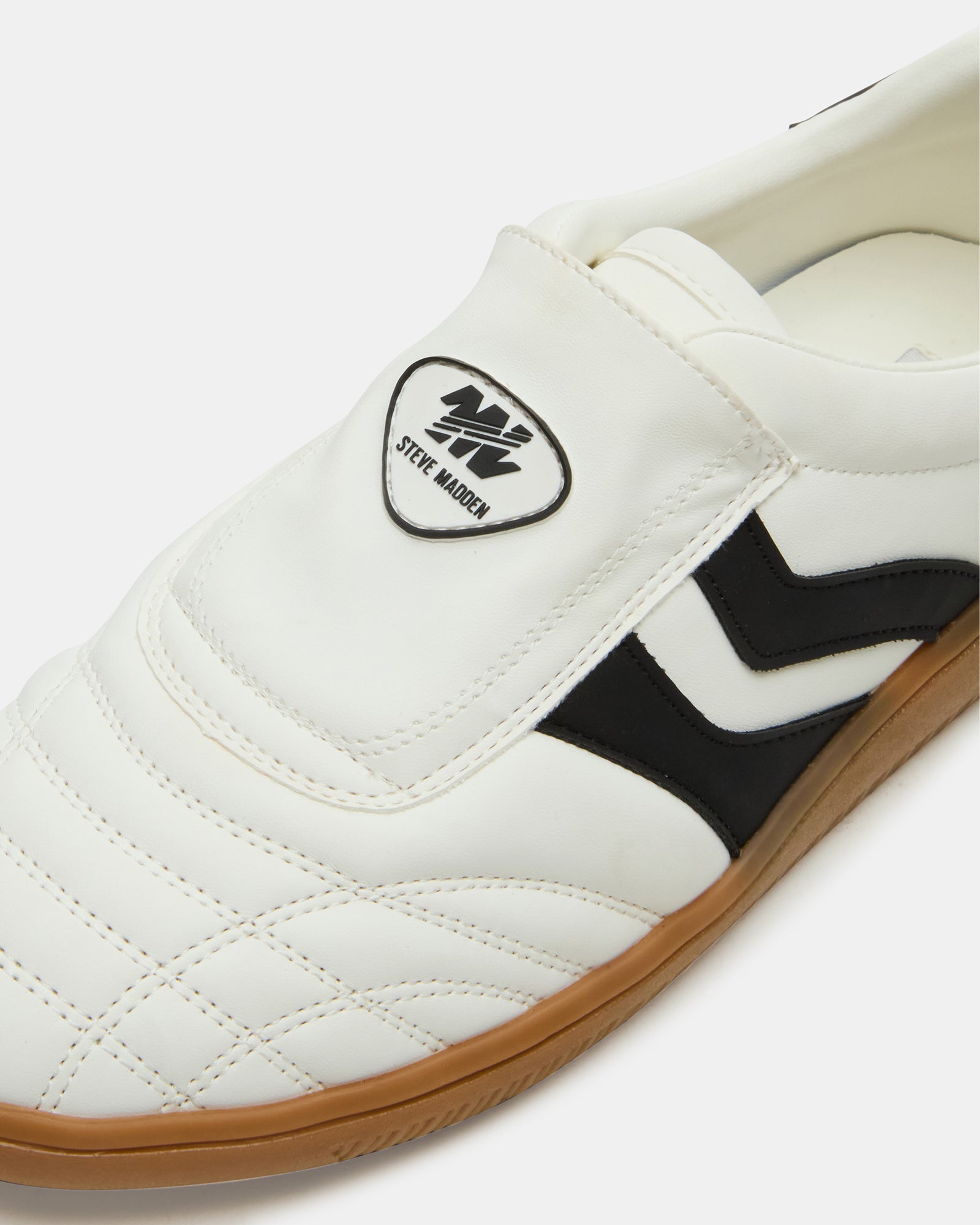 BOLT Vegan White Sneakers worn casually, perfect for everyday outings.