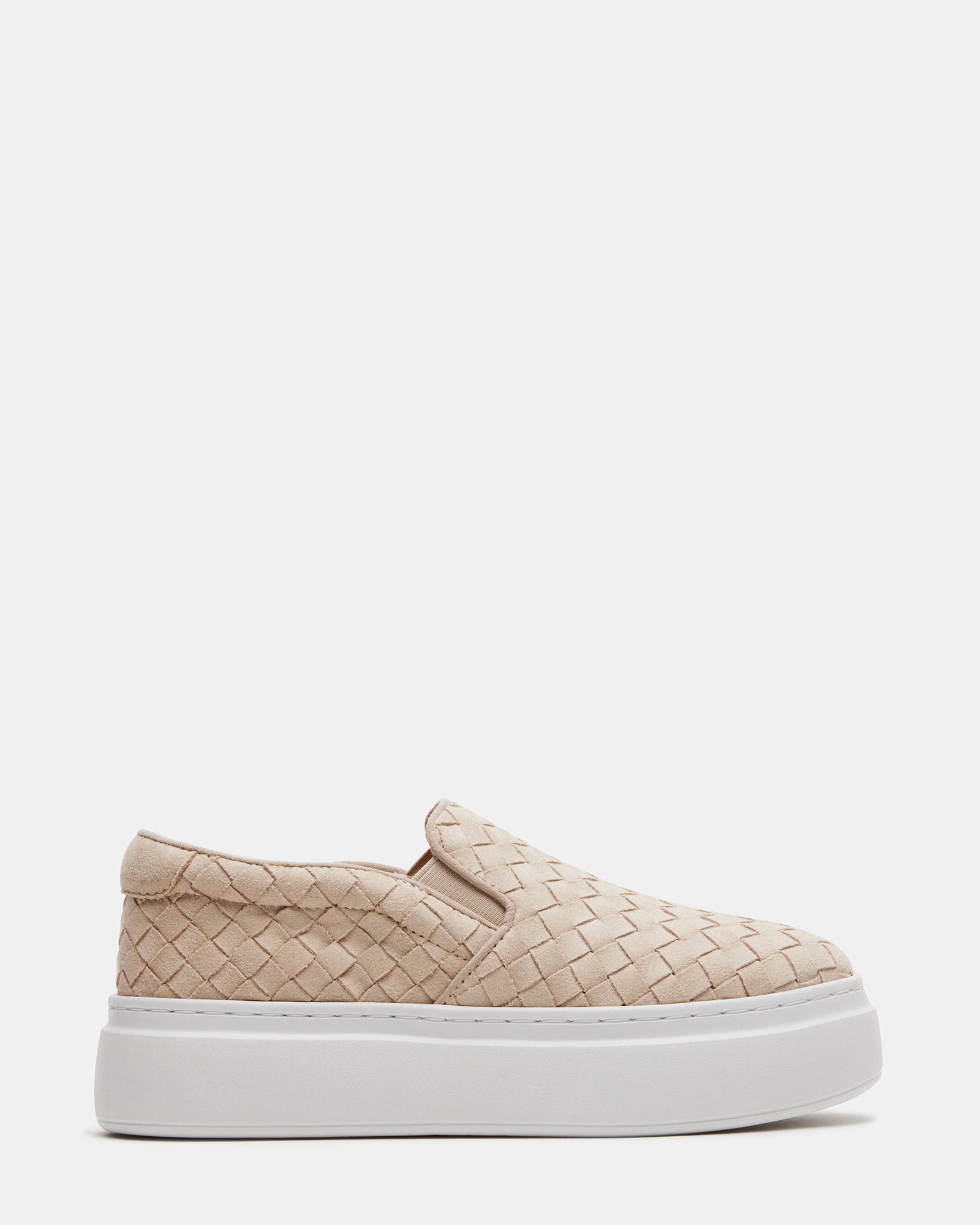 Elevate Taupe Platform Sneakers showcasing side view on a city street.