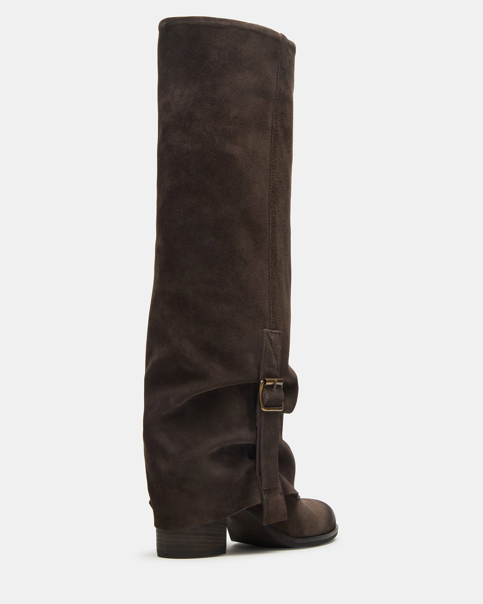 Fold-over boots displayed upright against rustic wood, perfect for wide calves.