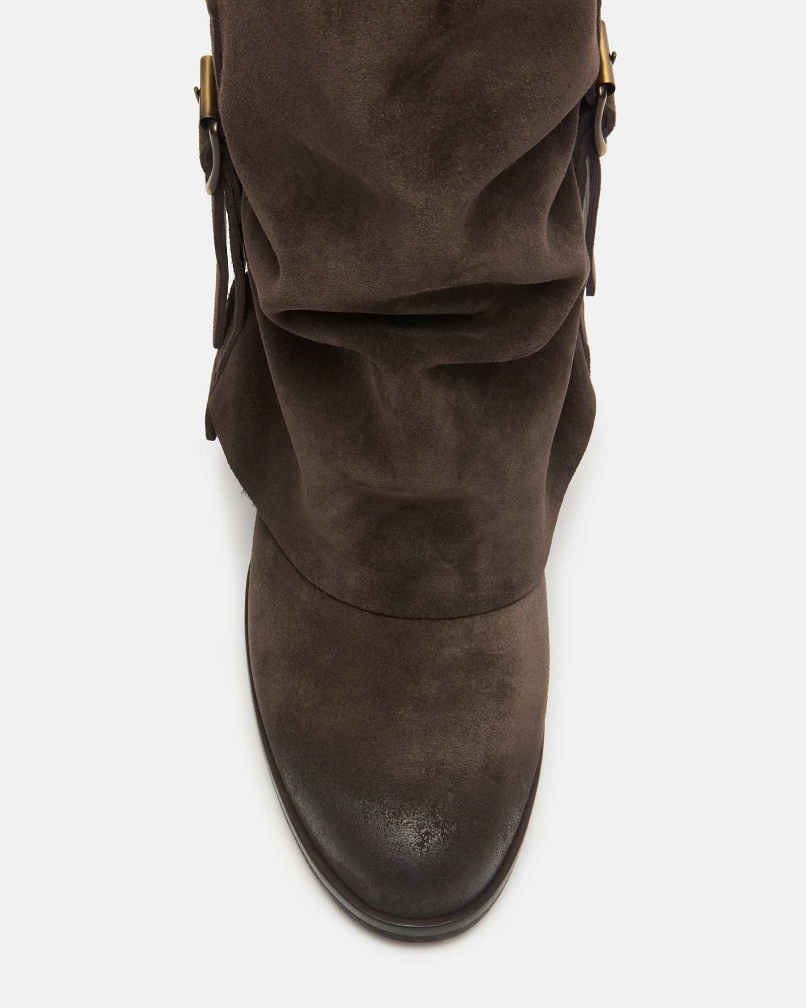 Close-up of the buckle detail on brown suede cowboy boots, ideal for fall styling.
