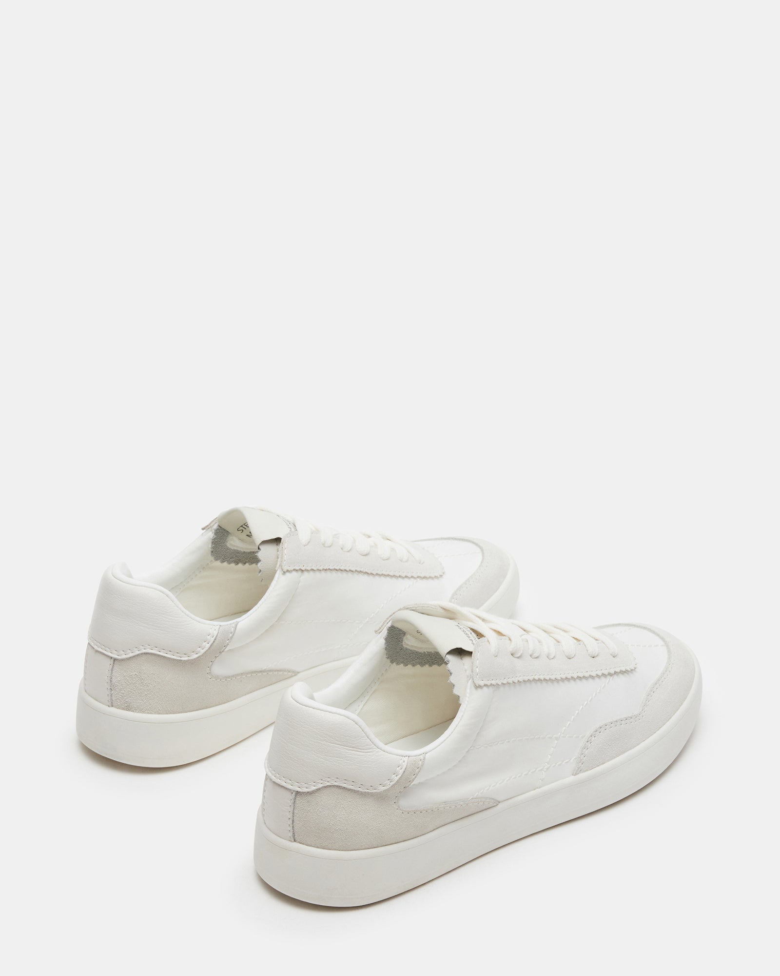 Close-up of Braxton lace-up sneakers highlighting the premium material.