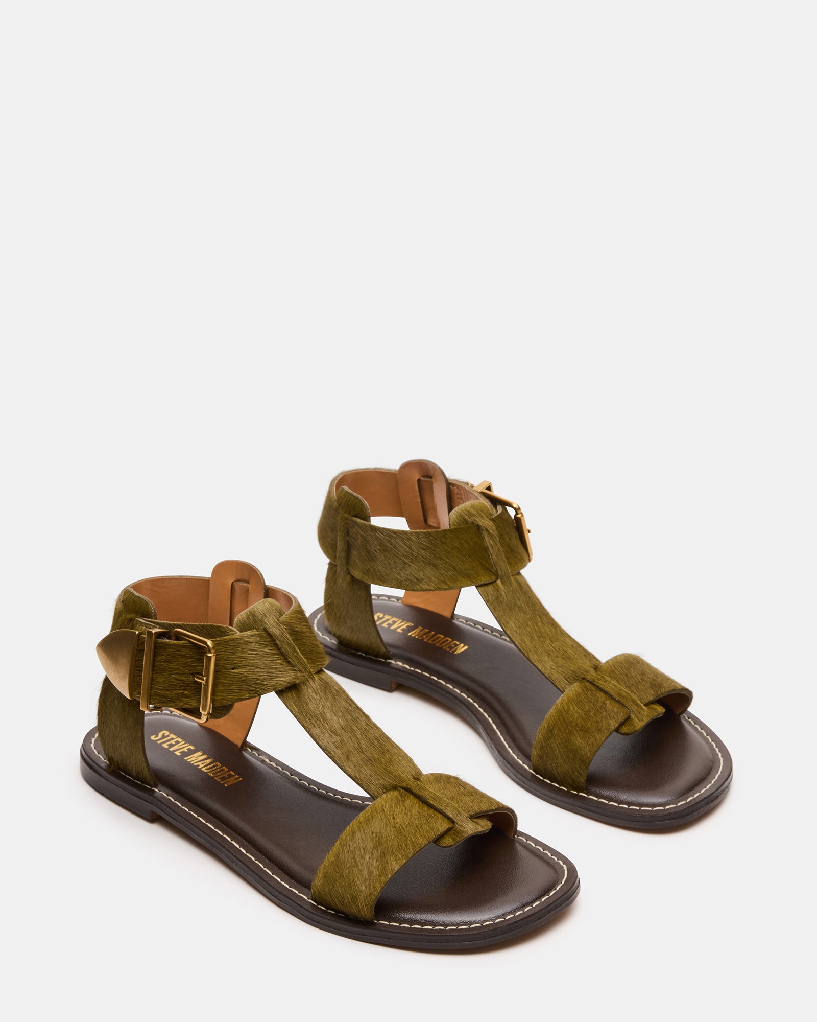 Close-up of ankle strap and leather detailing on the BRAZINN sandal.