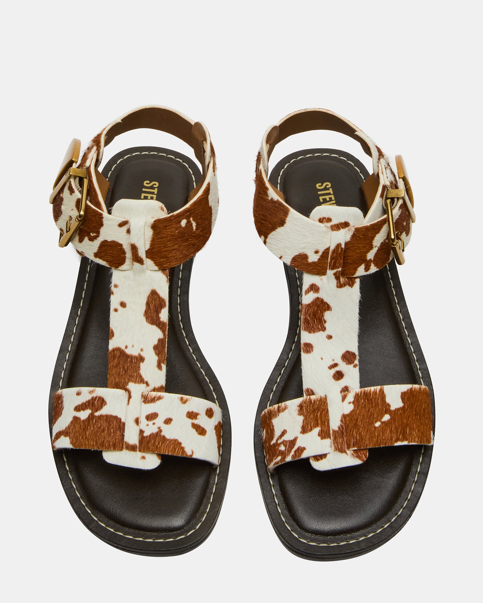 Elegant brown leather sandals with ankle strap for casual outings.