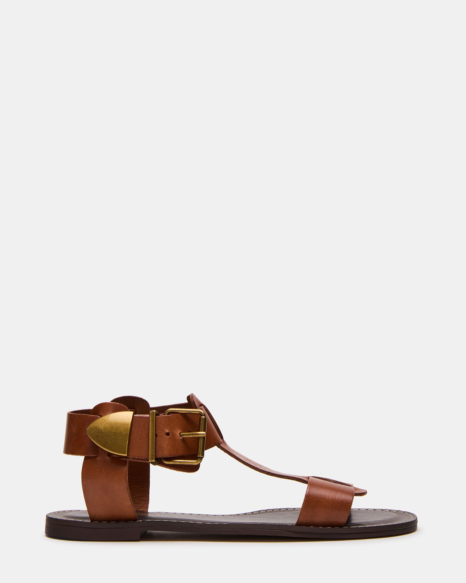 Side view of BRAZINN tan leather flat sandals with ankle strap and stylish straps