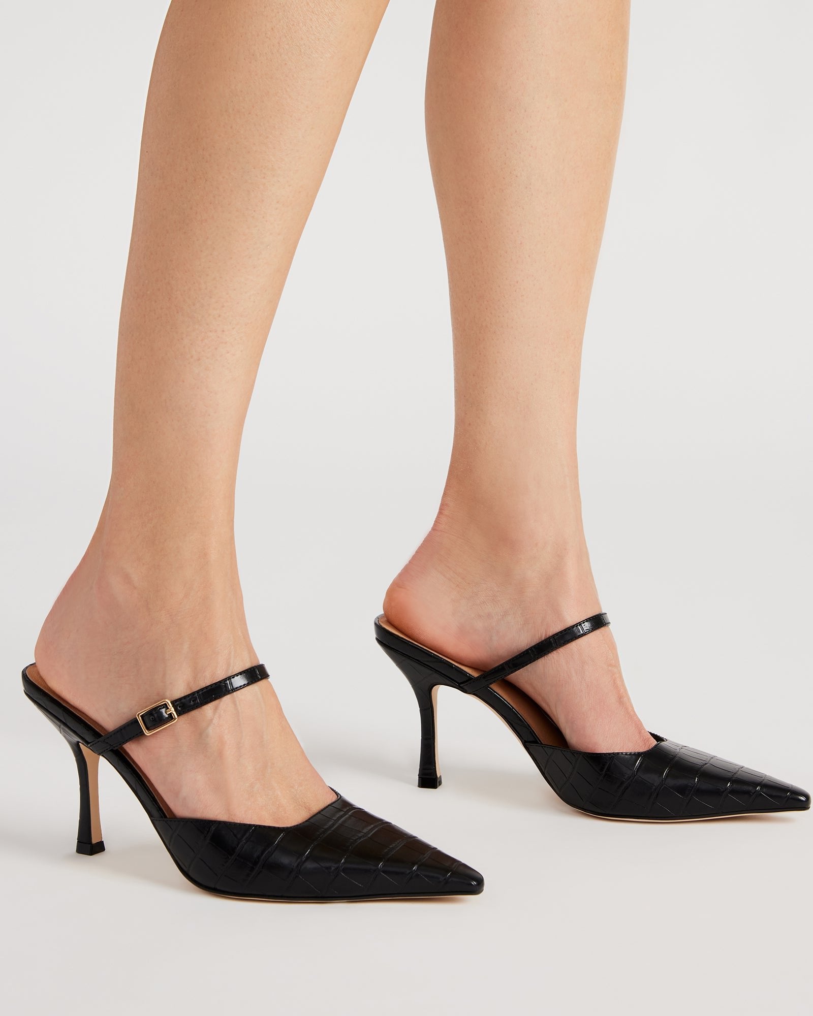 Top view of the elegant mule shoes with mary jane strap detail