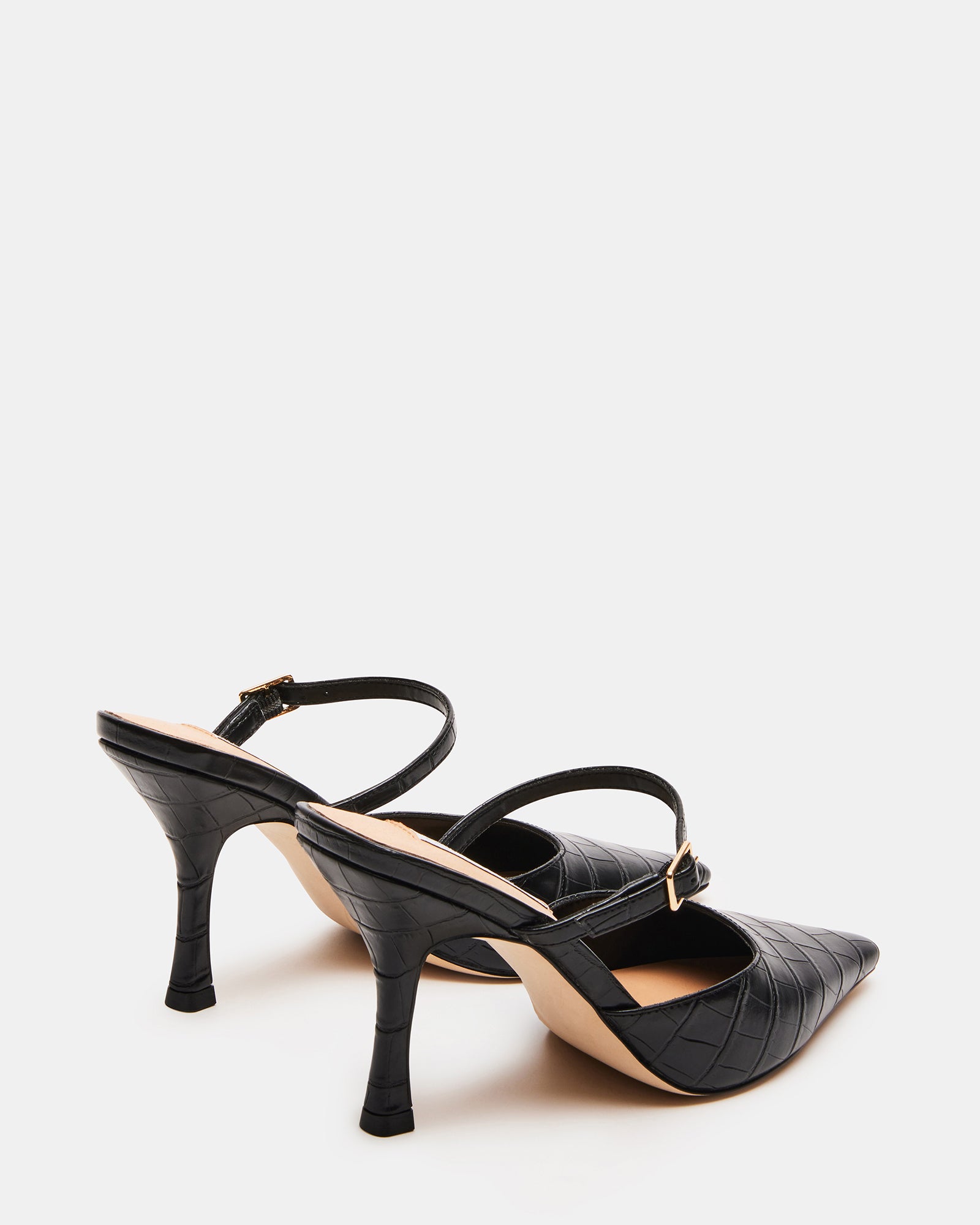 Styled outfit featuring the luxury crocodile-textured mule heels