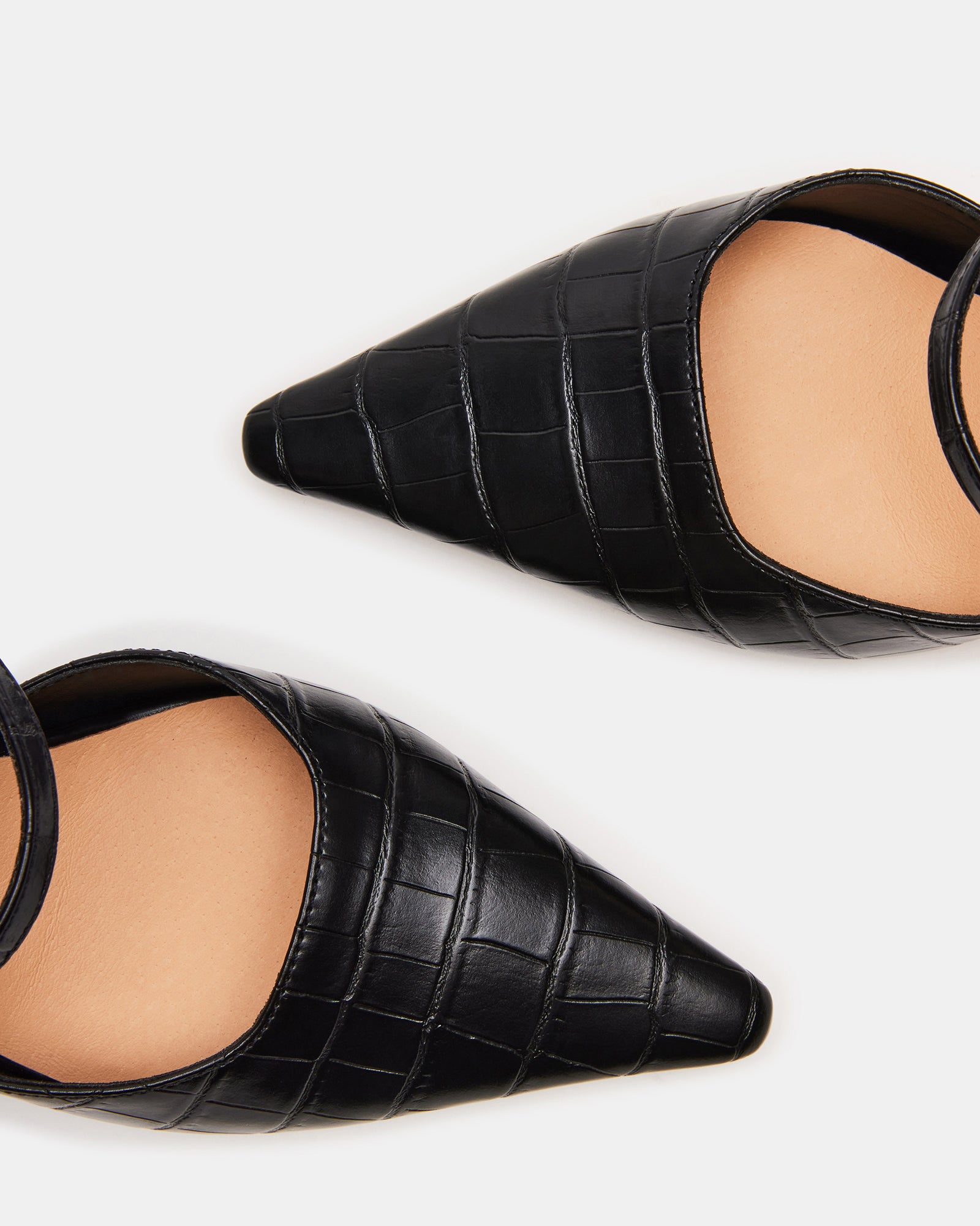 Side view of black crocodile mule heels with pointed toe and 3.75-inch heel