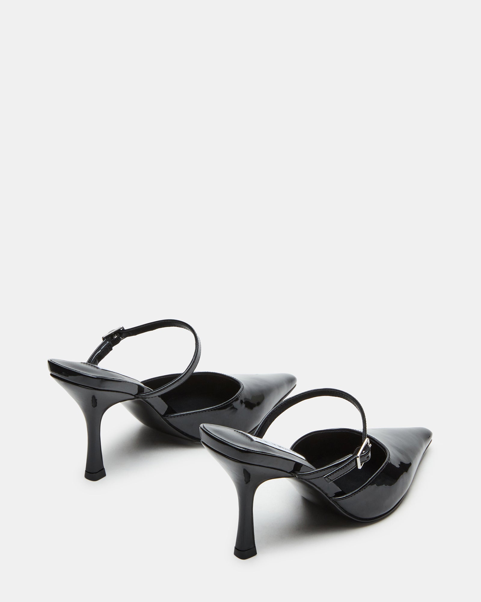 Model wearing Brecki Luxe mules styled for a chic evening look.