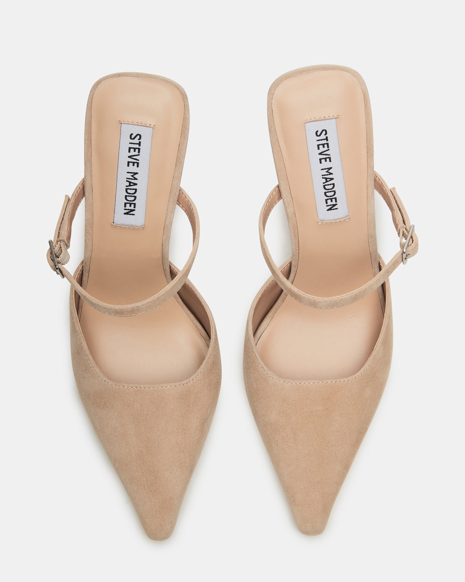 Side view of pointed toe pumps highlighting Mary Jane strap detail