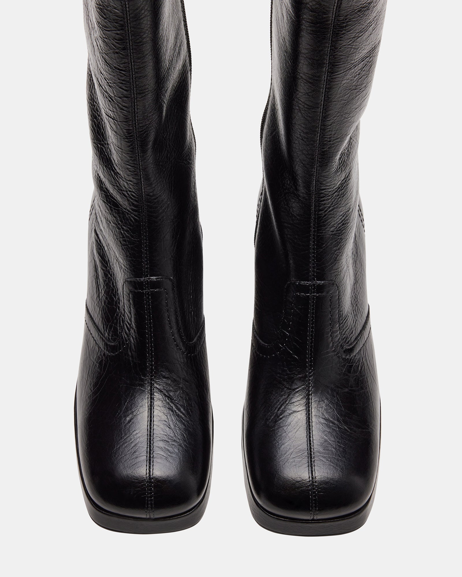 Side view of Brentwood black leather ankle booties with square toe and block heel