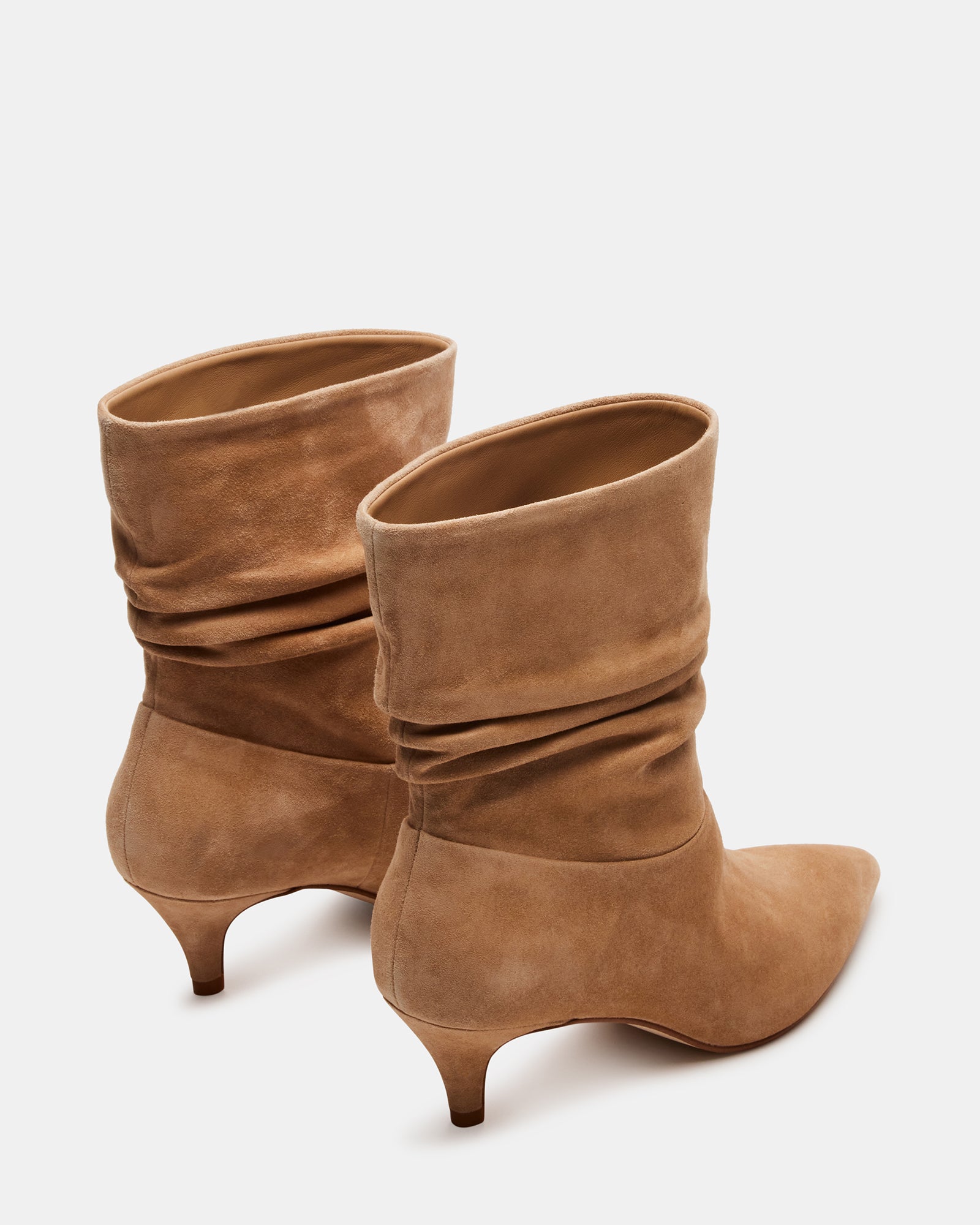 Side view of black ankle boots with a trendy kitten heel, perfect for casual outings.