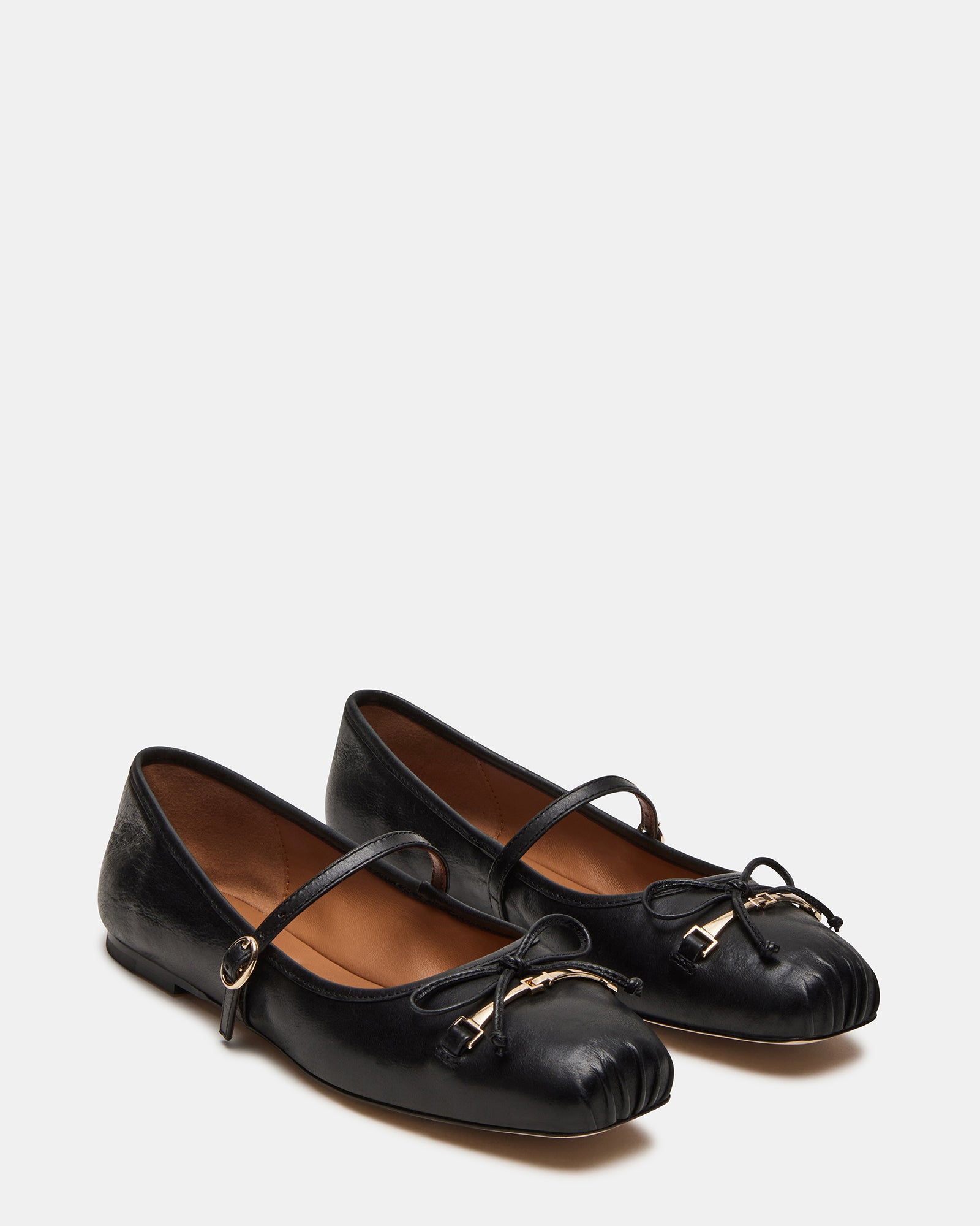 Side profile of BRIO flats showcasing square toe and hardware accents