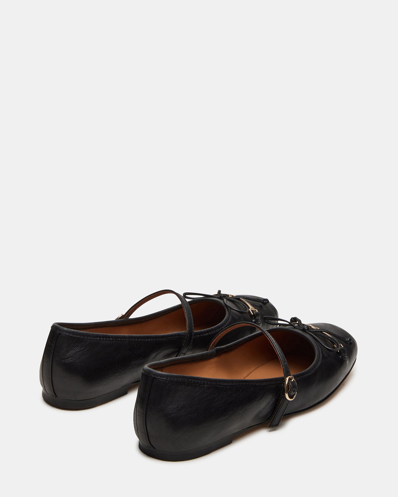 Side profile of BRIO flats showcasing square toe and hardware accents
